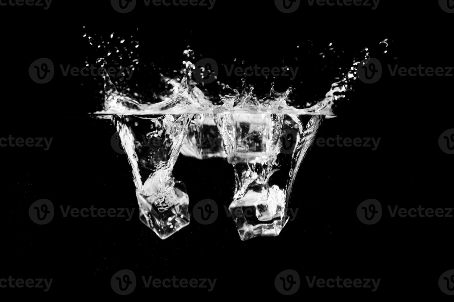 ice cubes on a black background photo