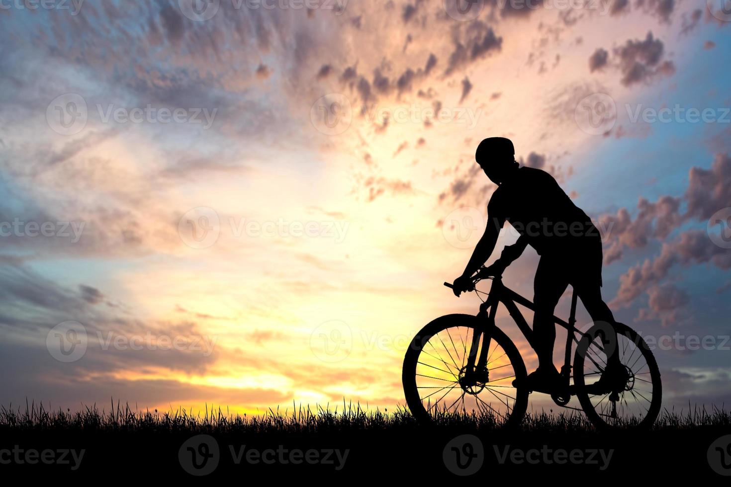 Silhouettes of bikes and cyclists travel concept and exercise by bicycle photo