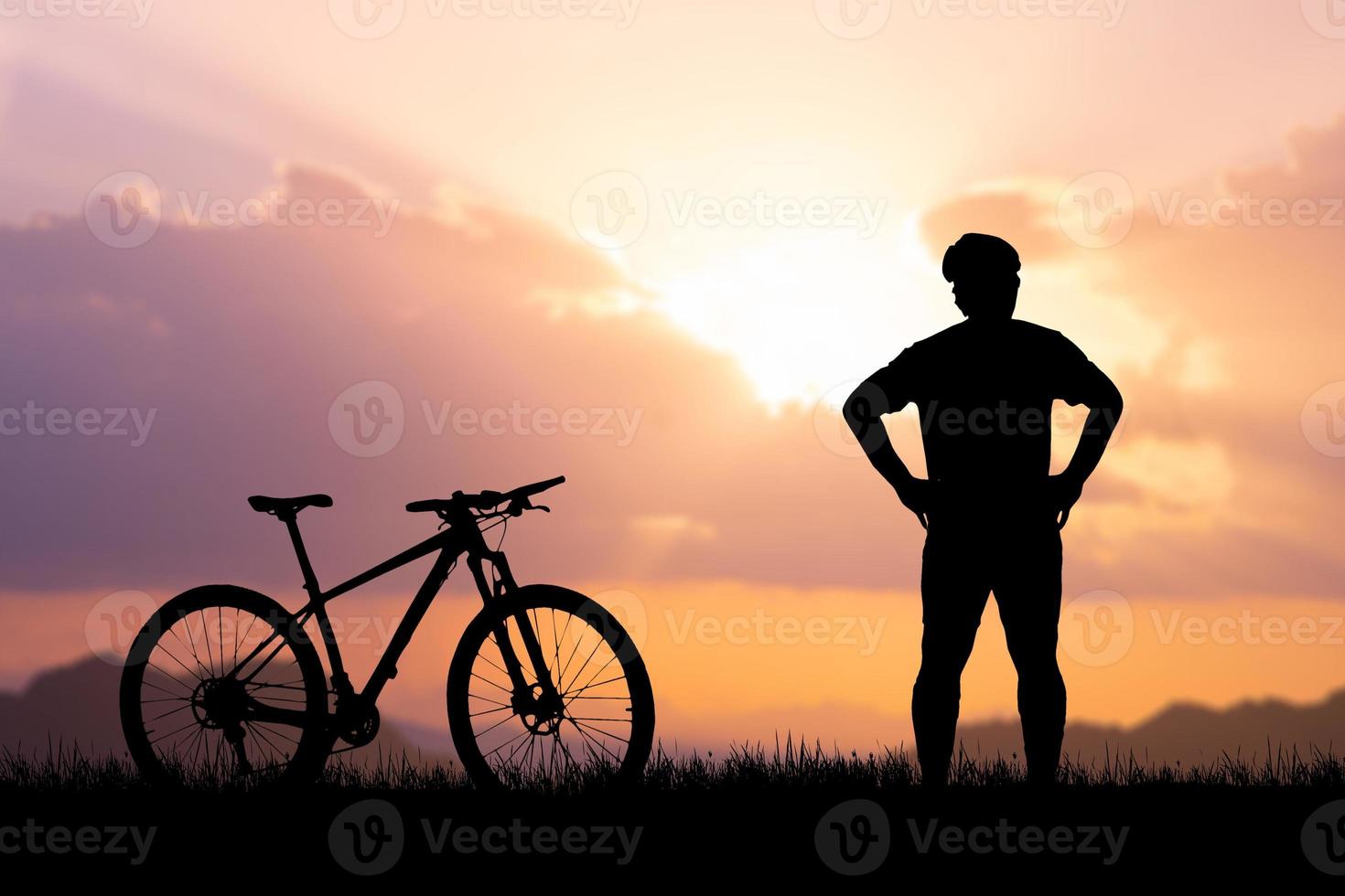 Silhouettes of bikes and cyclists travel concept and exercise by bicycle photo