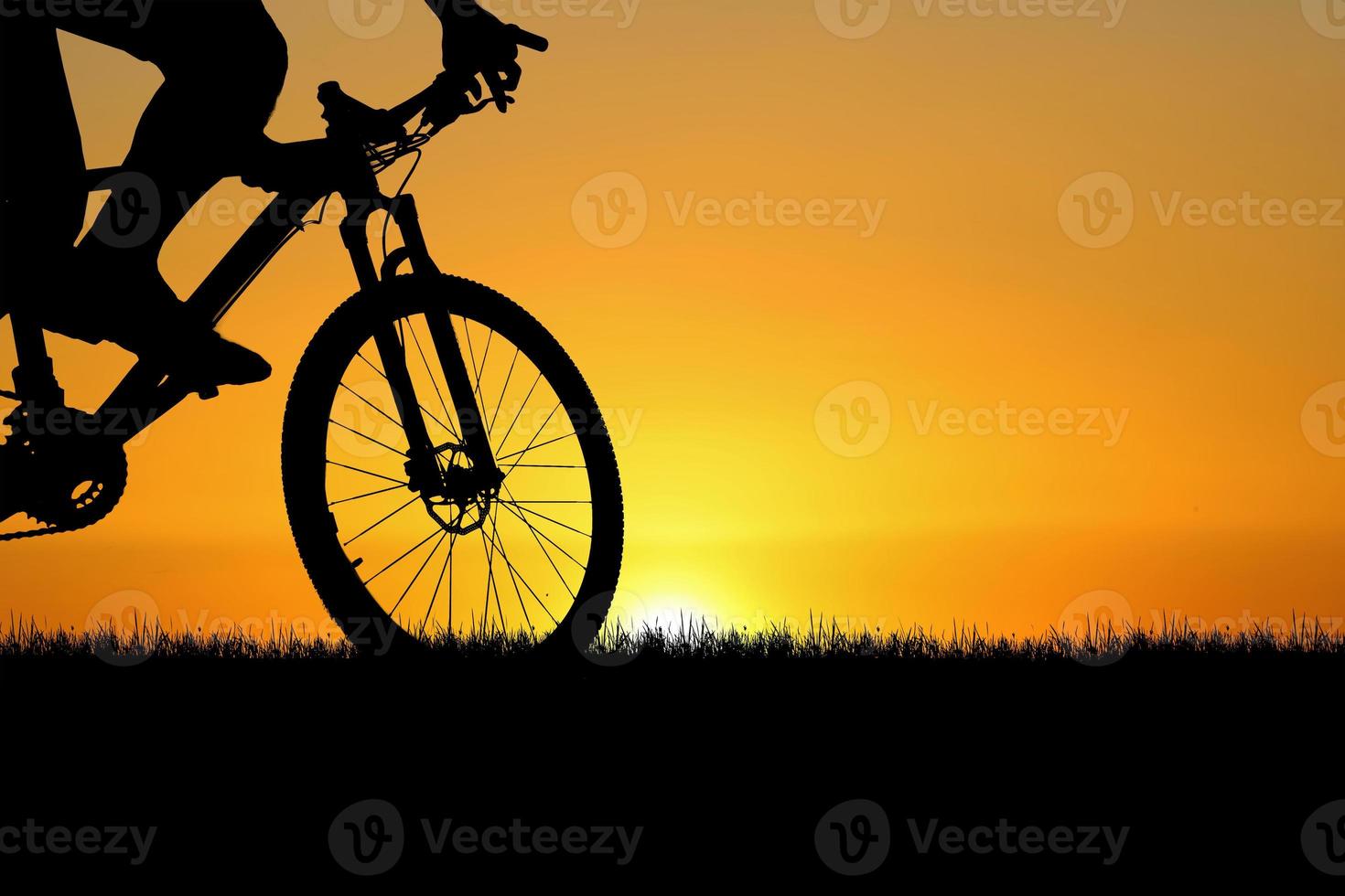 Silhouettes of bikes and cyclists travel concept and exercise by bicycle photo