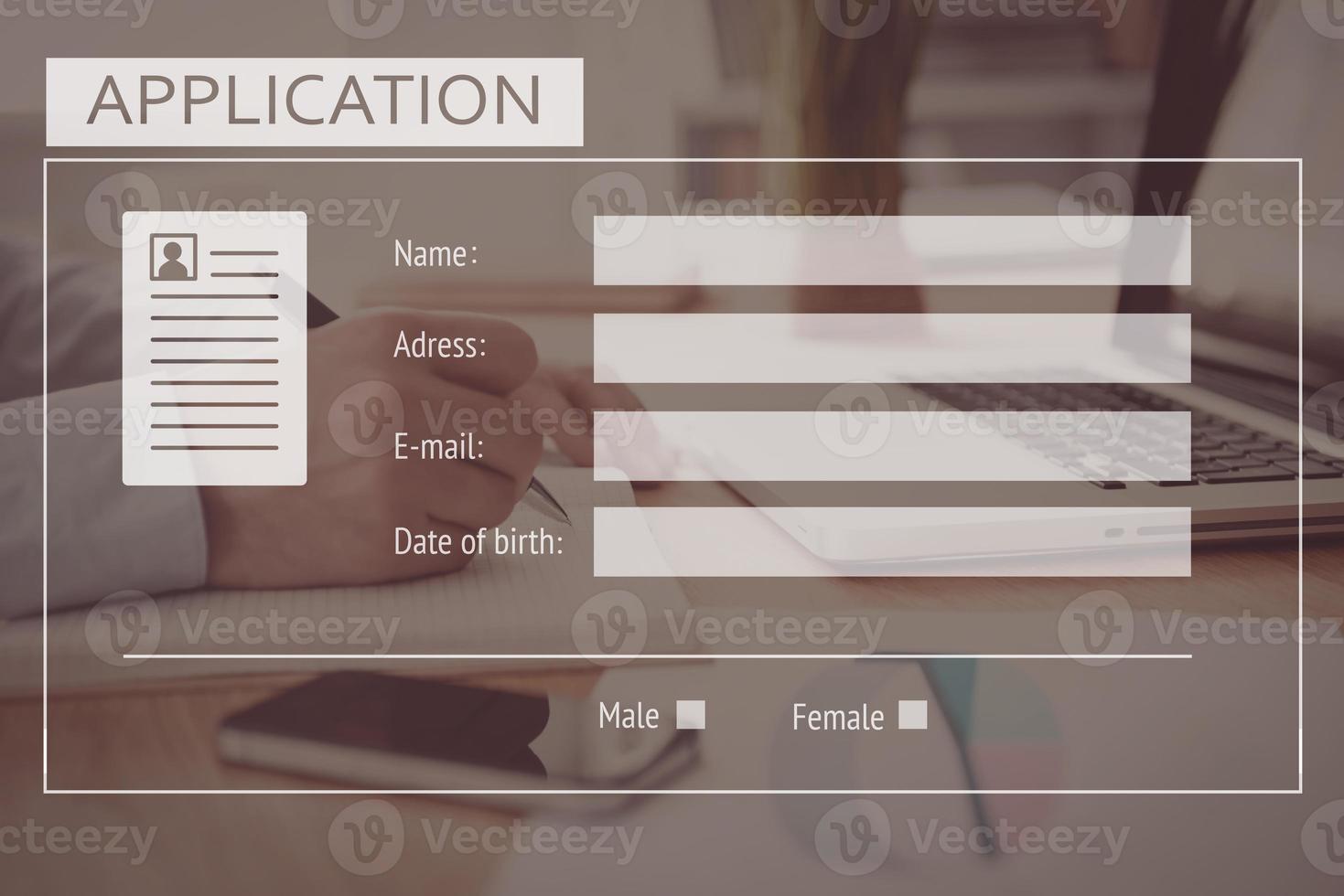 Application form. Close-up of business man writing something in his note pad with digitally composed application form over it photo