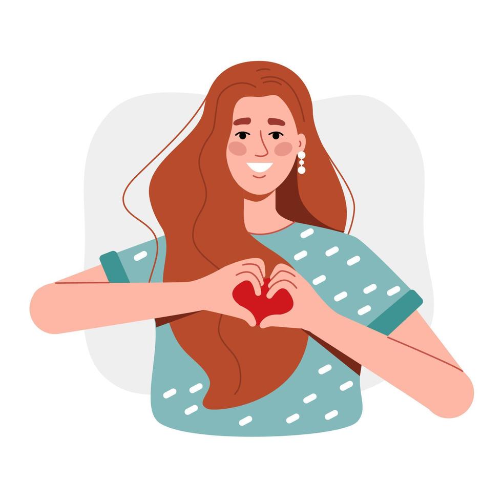 the red-haired girl smiles and shows her heart with her hands. A woman in a T-shirt loves and shows a gesture on a white background vector