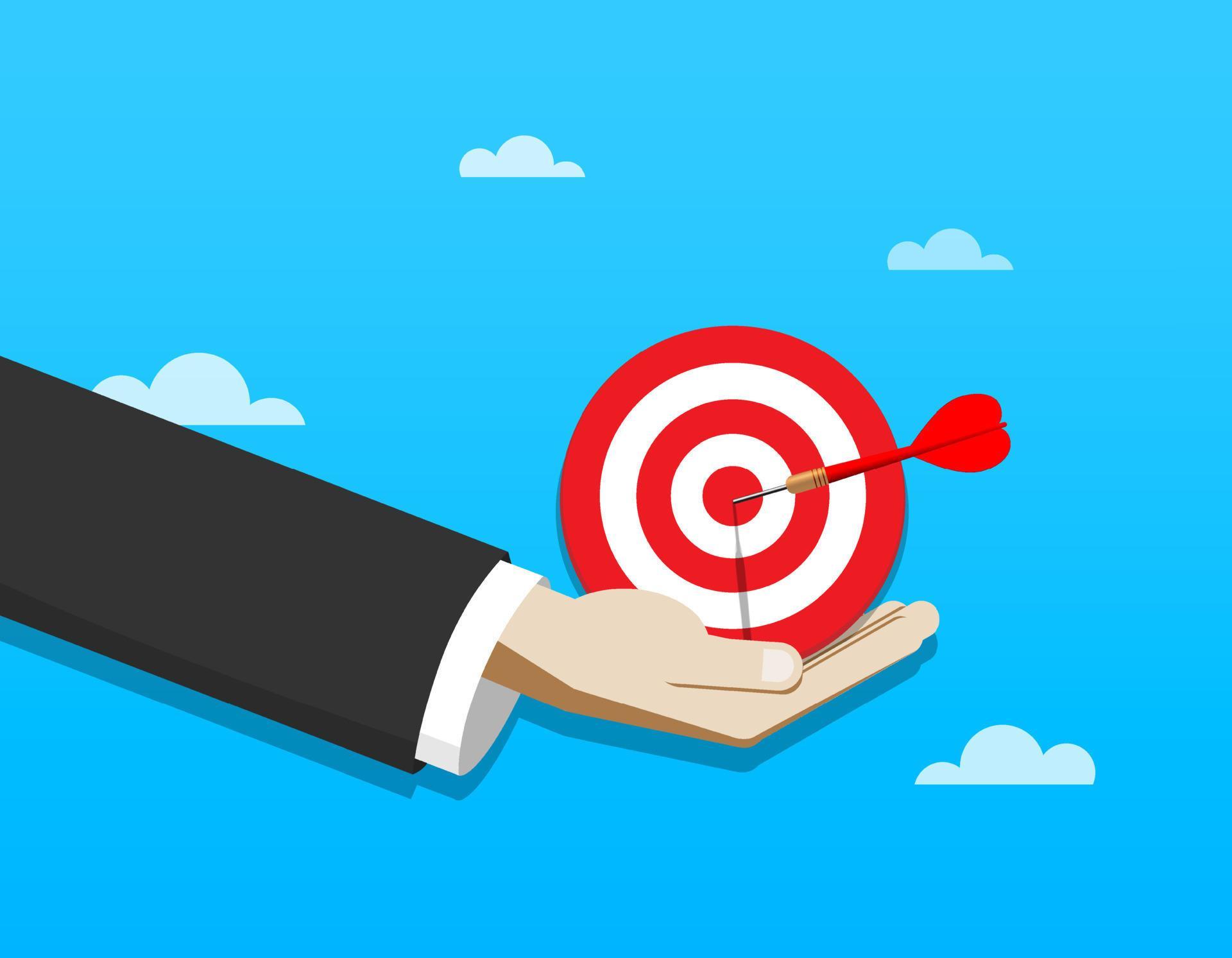 Businessman hand with dartboard and dart. Business target success