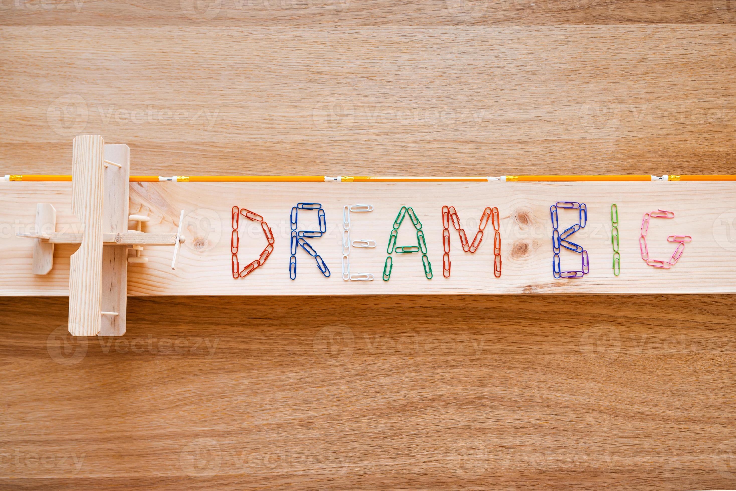 Dream big. Top view of dream big text made from colorful staples and