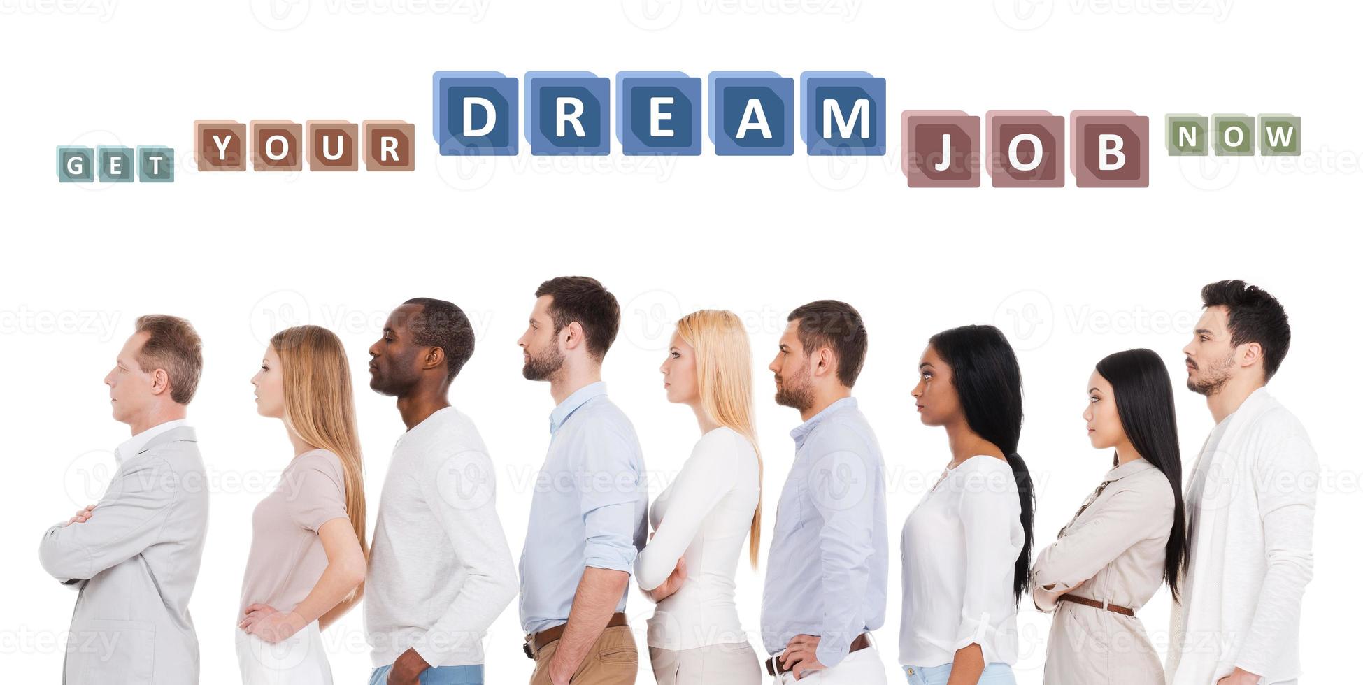 Find your dream job Side view of confident diverse group of people in smart casual wear looking away while standing in a row and against white background photo