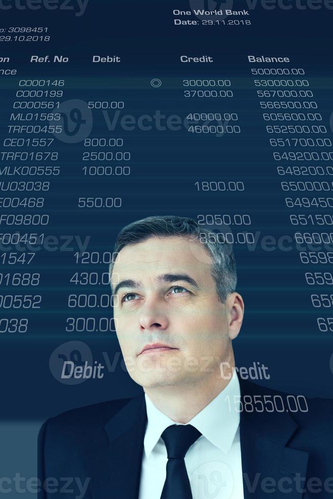 Looking into future. Digitally generated image of mature businessman looking up at account statement photo