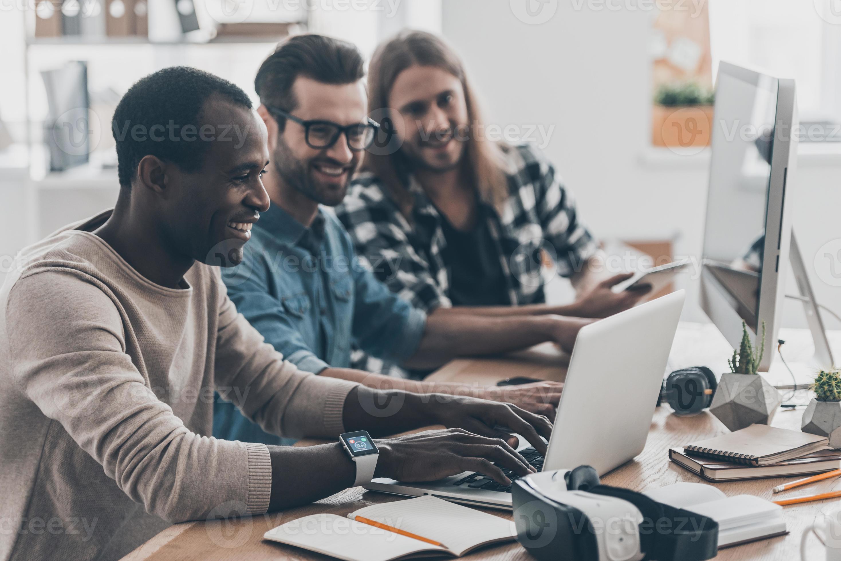 Busy working day. Group of successesful young people working together