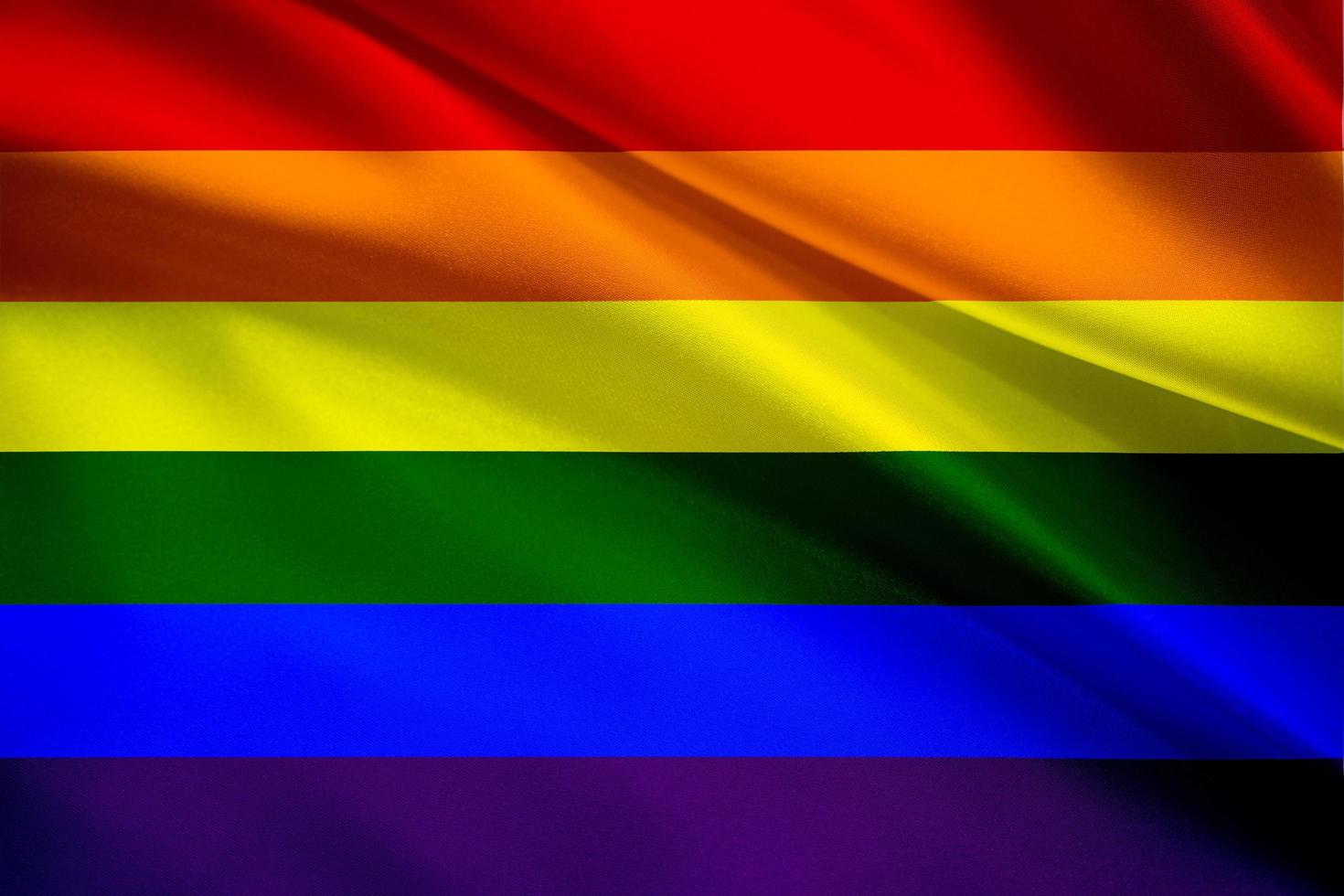 LGBT wave rainbow flag for pride month social movement rainbow flag is a symbol of lesbian, gay, bisexual, transgender, human rights, tolerance and peace photo