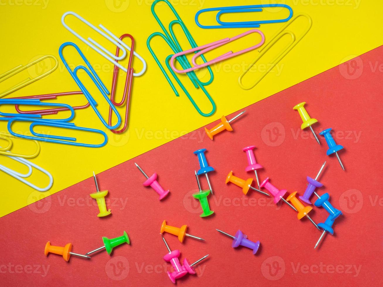 Paper work. Colored paper clips. Work with documents. Office. photo