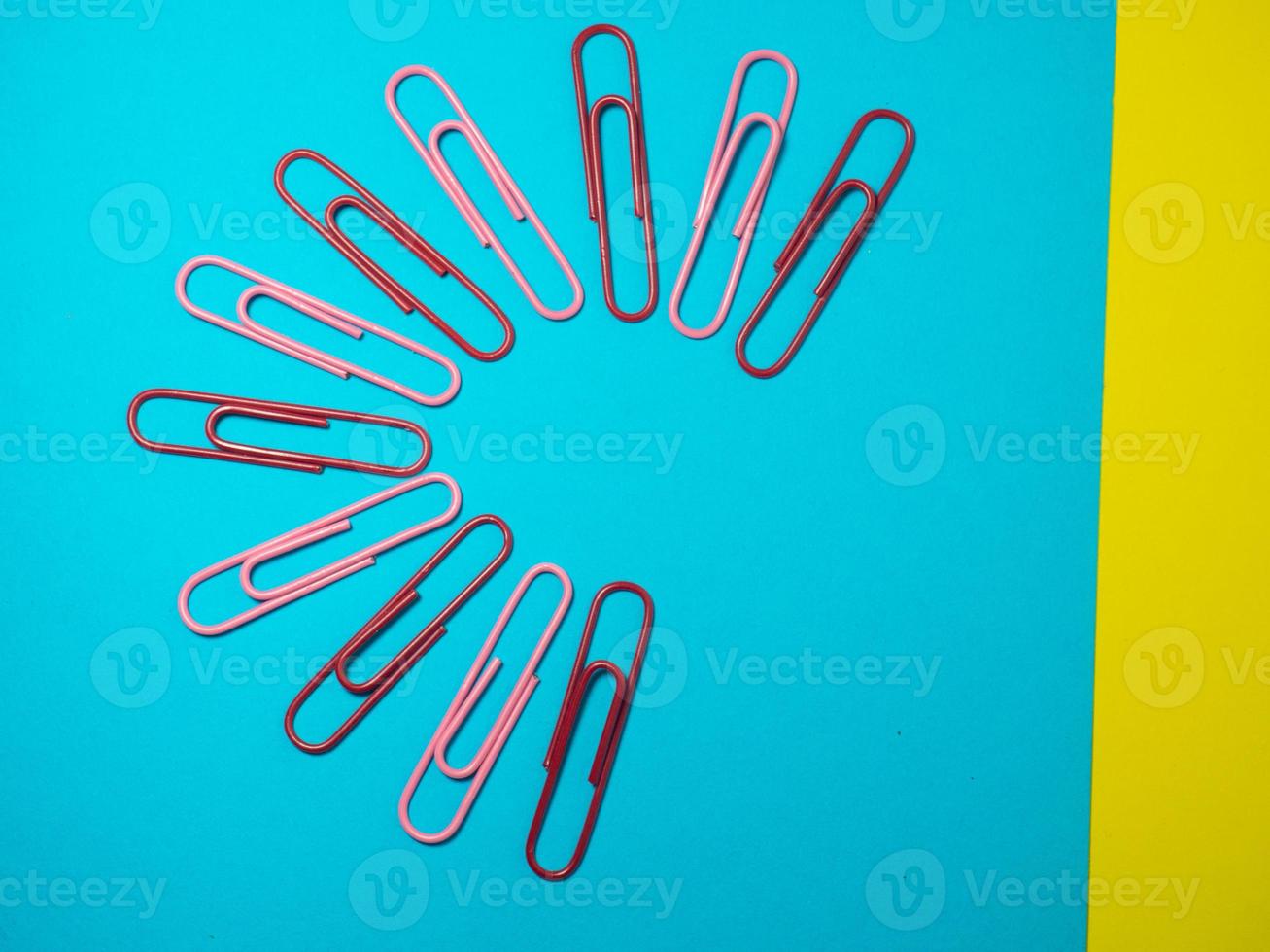 Paper work. Colored paper clips. Work with documents. Office. photo