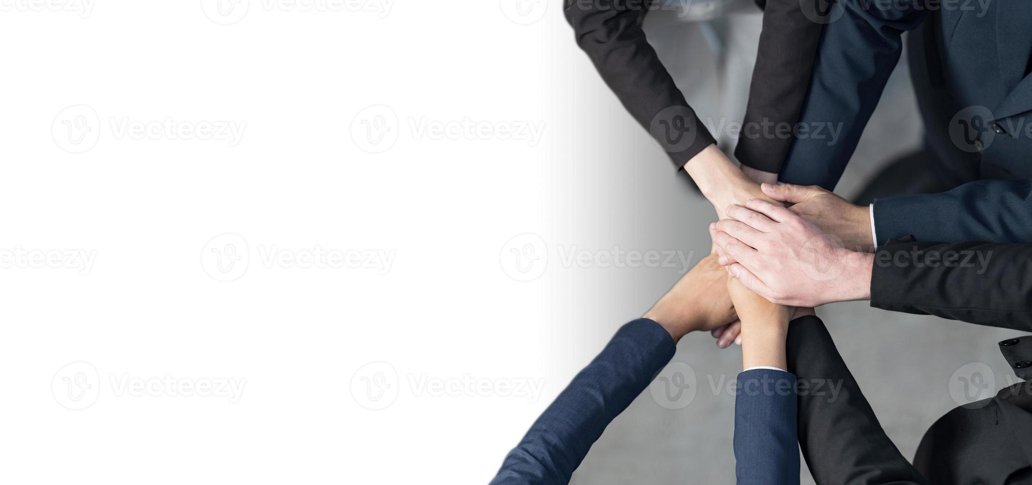 Cropped view of Group of Business people putting their hands together, Friends with stack of hands showing unity, Teamwork, Success and Unity concept photo