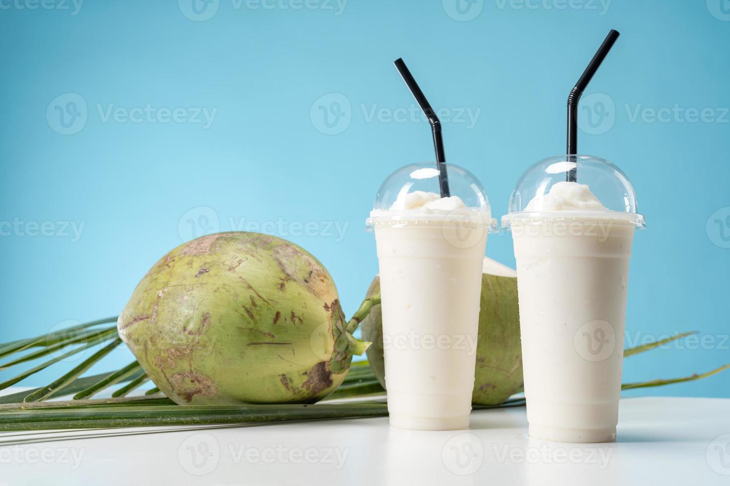 A glass of sweet coconut water coconut fragrance. photo