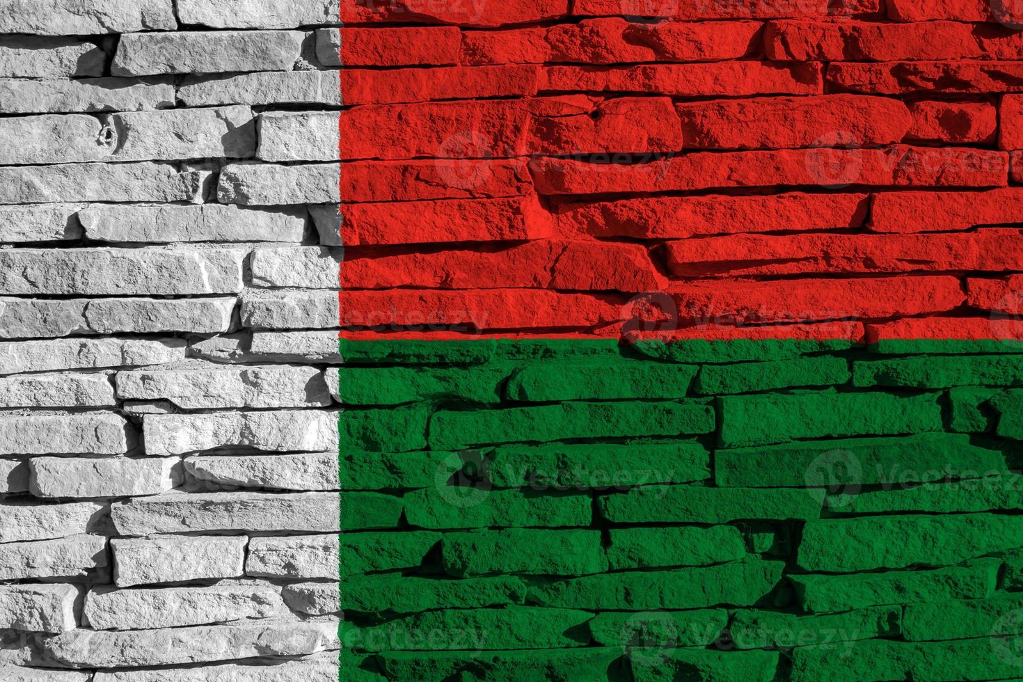 Madagascar flag on texture. Concept collage. 26 June Madagascar Independence Day Flag. photo
