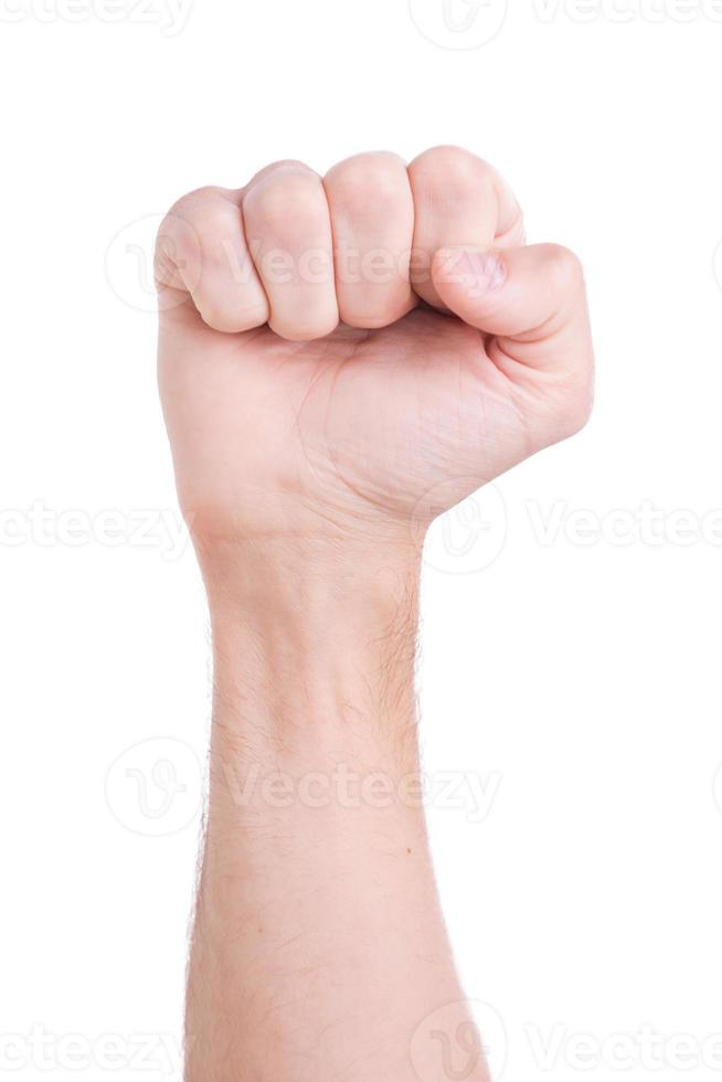 Fist. Close-up of male fist isolated on white photo