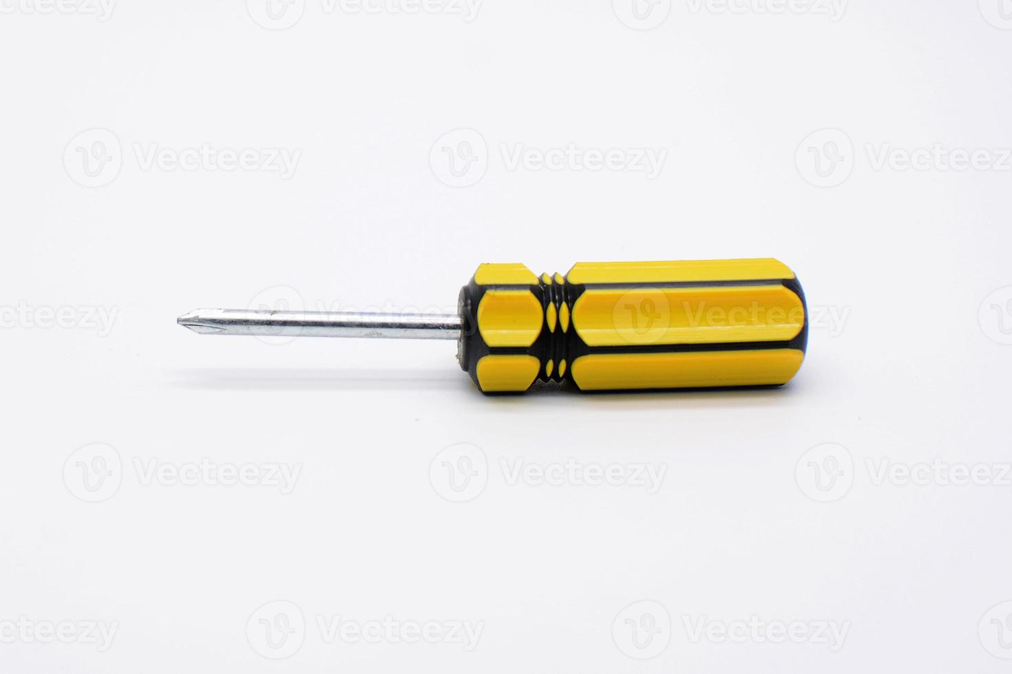 Screwdriver on white photo