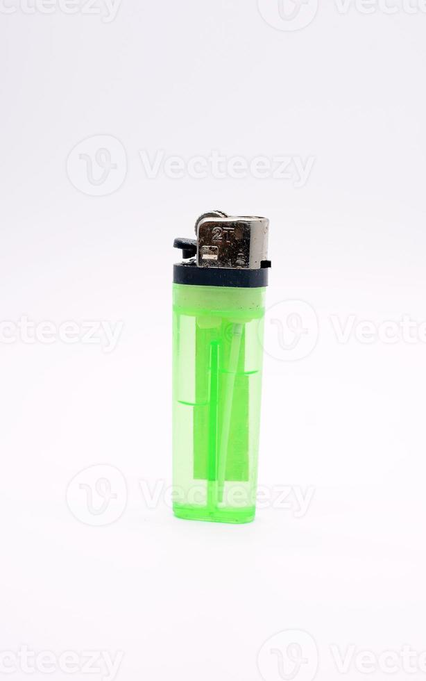 Green lighter on white photo