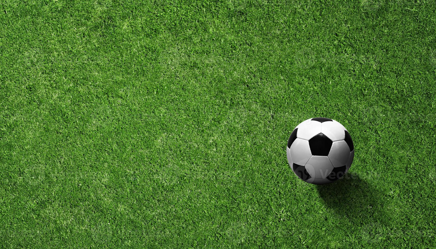 Soccer ball on green playground. Soccer concept photo