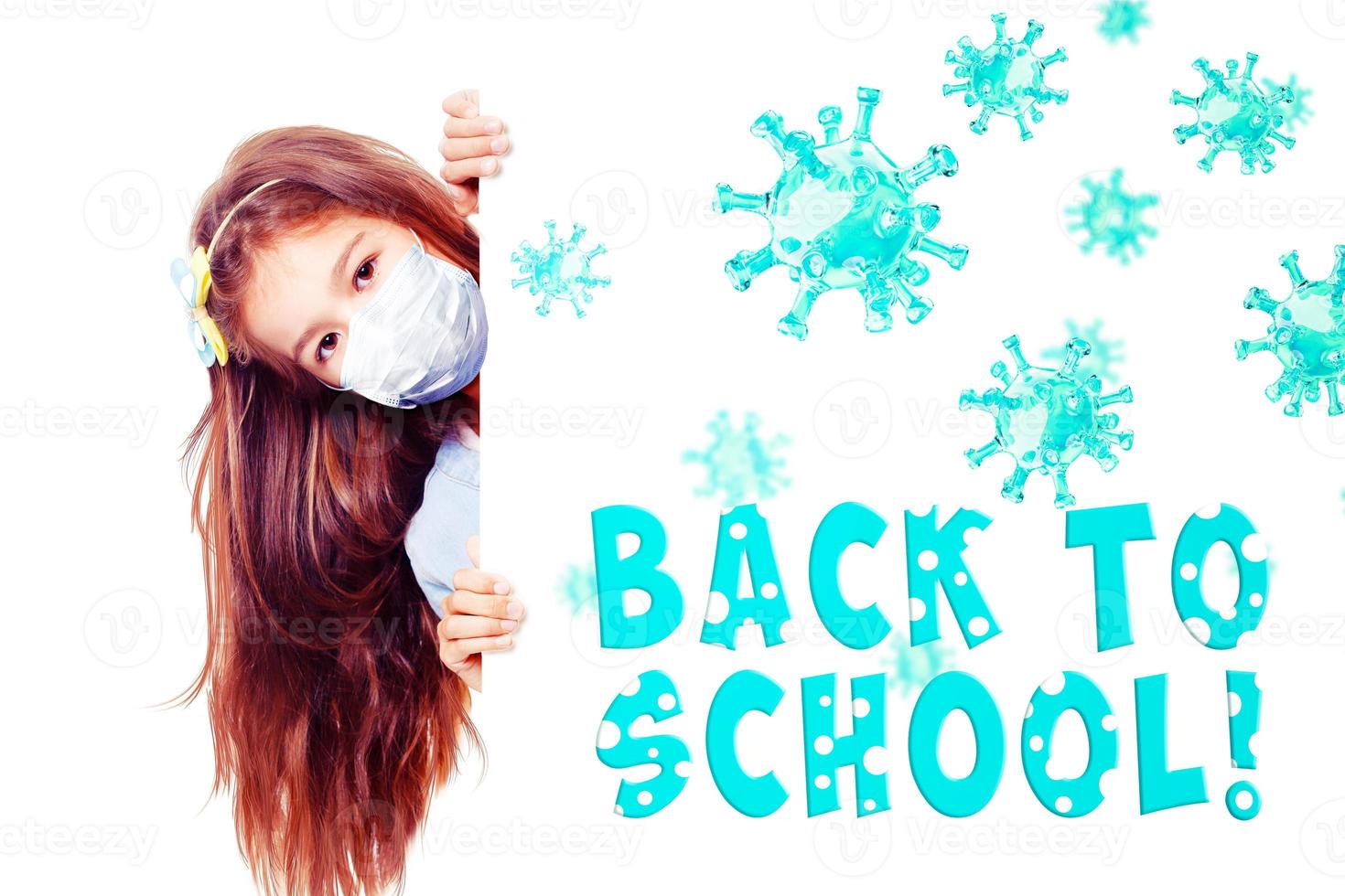 Young girl with protection mask against corona virus at school. photo