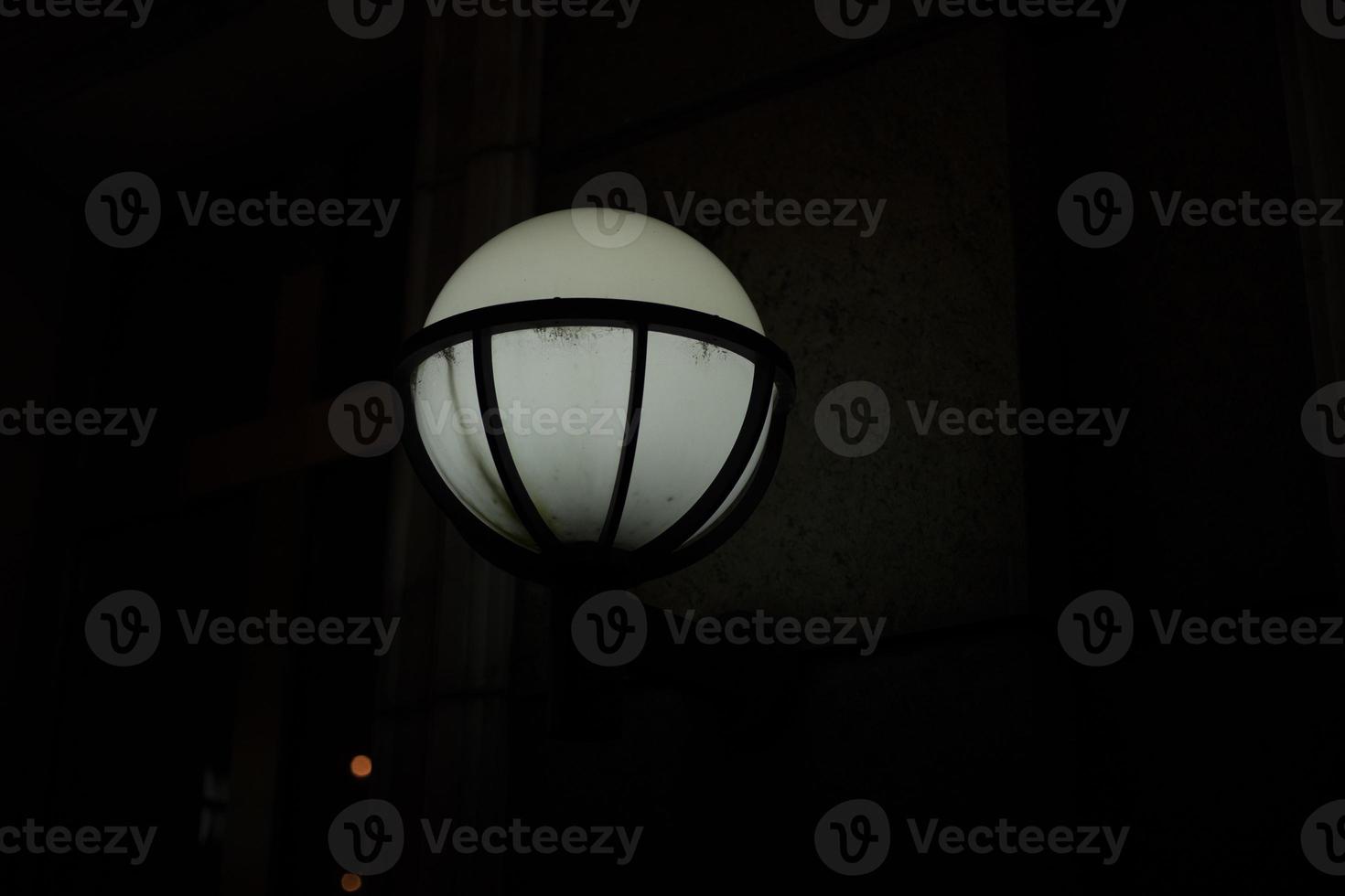 Lamp on street. Light in city. Round light source. photo