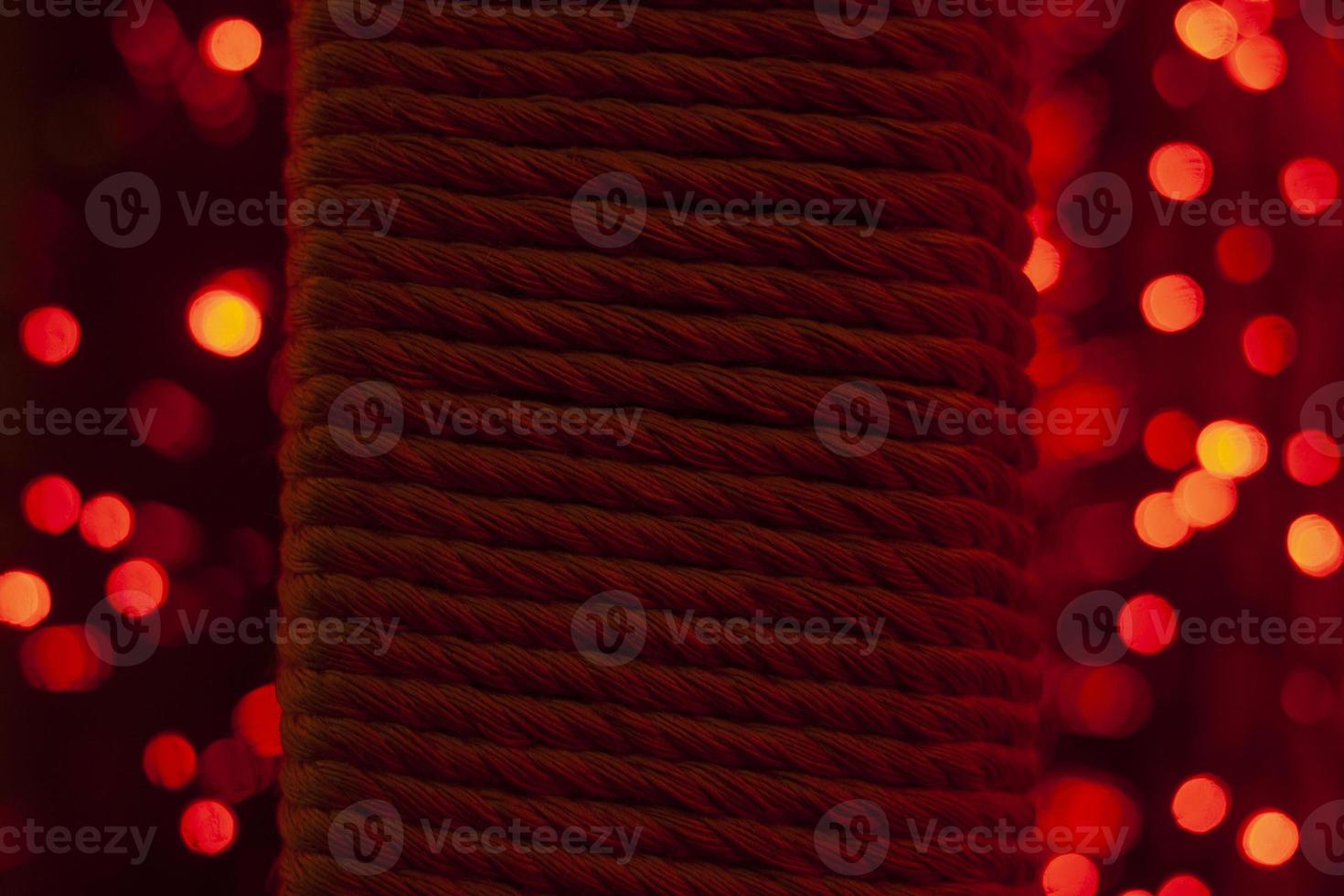 Fiber texture. Thick thread around pole. Braided interior detail. Support surface. Natural material. photo