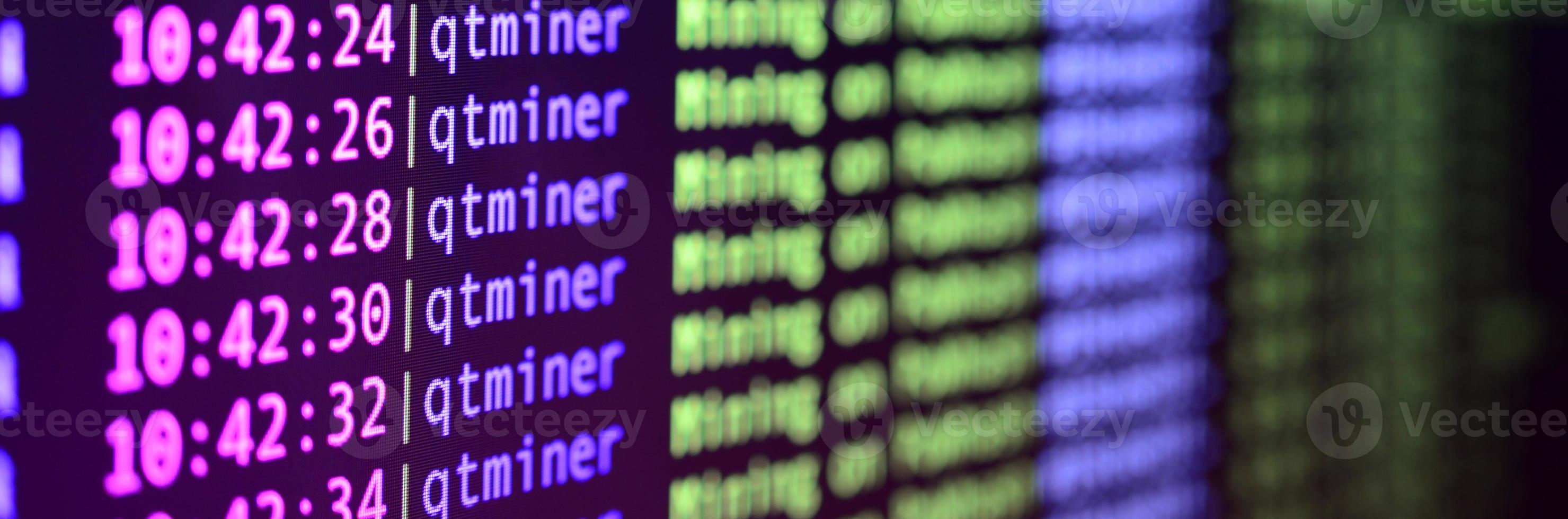 Macro snapshot of the program interface for crypto currency mining on the monitor of an office computer. The concept of mining bitcoins. The flow of information strings and data photo