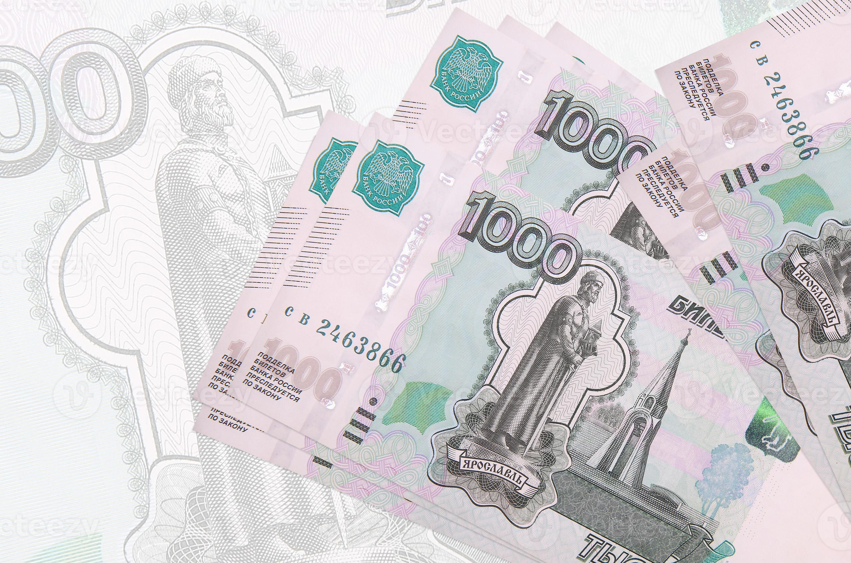 1000-russian-rubles-bills-lies-in-stack-on-background-of-big-semi