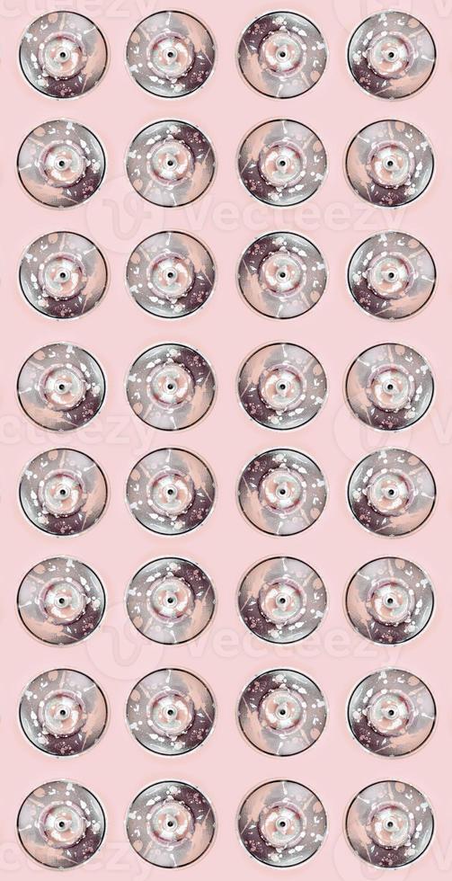 Many used spray cans for graffiti drawing lies on a pastel colored backgroung. Street art painting concept. Minimal flat lay pattern. Top view photo