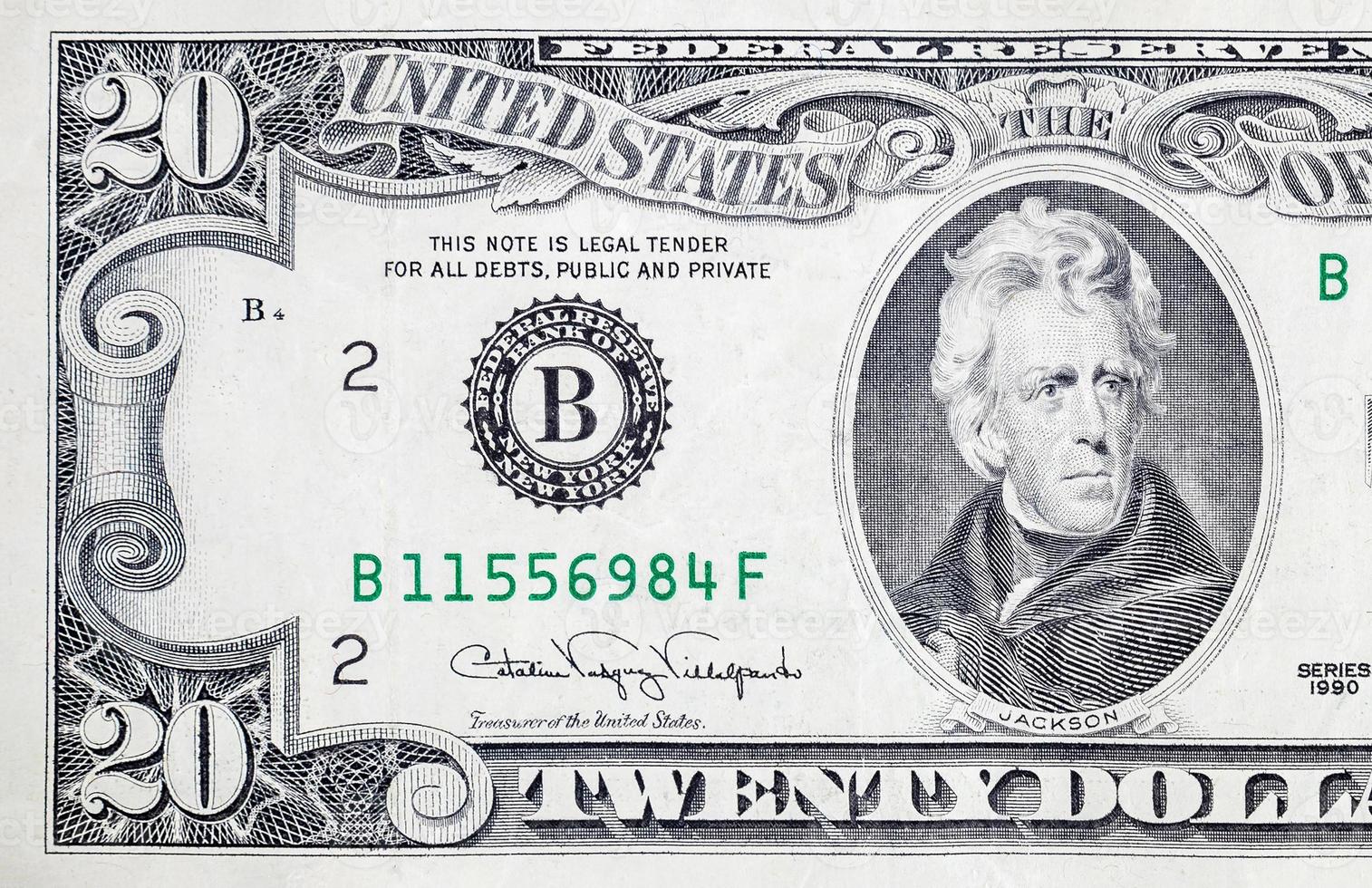 Portrait of US president Andrew Jackson on 20 dollars banknote closeup macro fragment photo