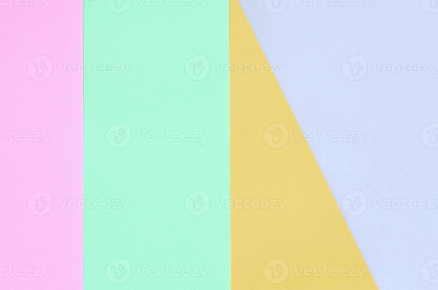 Texture background of fashion pastel colors. Pink, violet, orange and blue geometric pattern papers. photo