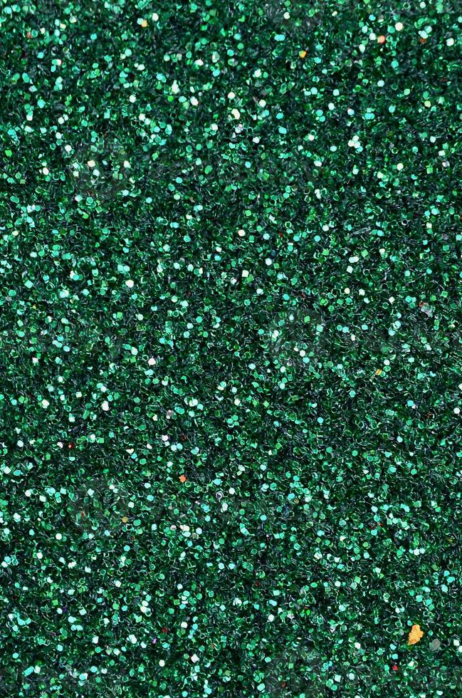 colorido fondo verde esmeralda desenfocado con manchas brillantes y brillantes foto
