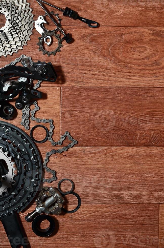 Many different metal parts and components of the running gear of a sports bike photo