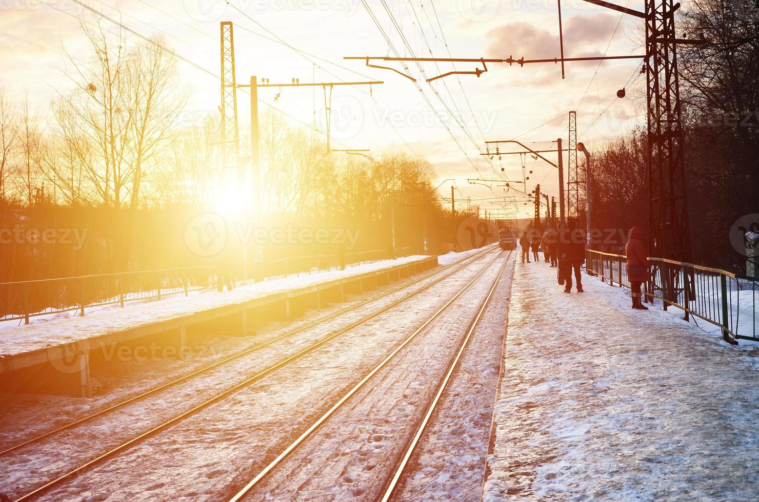 Evening winter landscape with the railway station photo