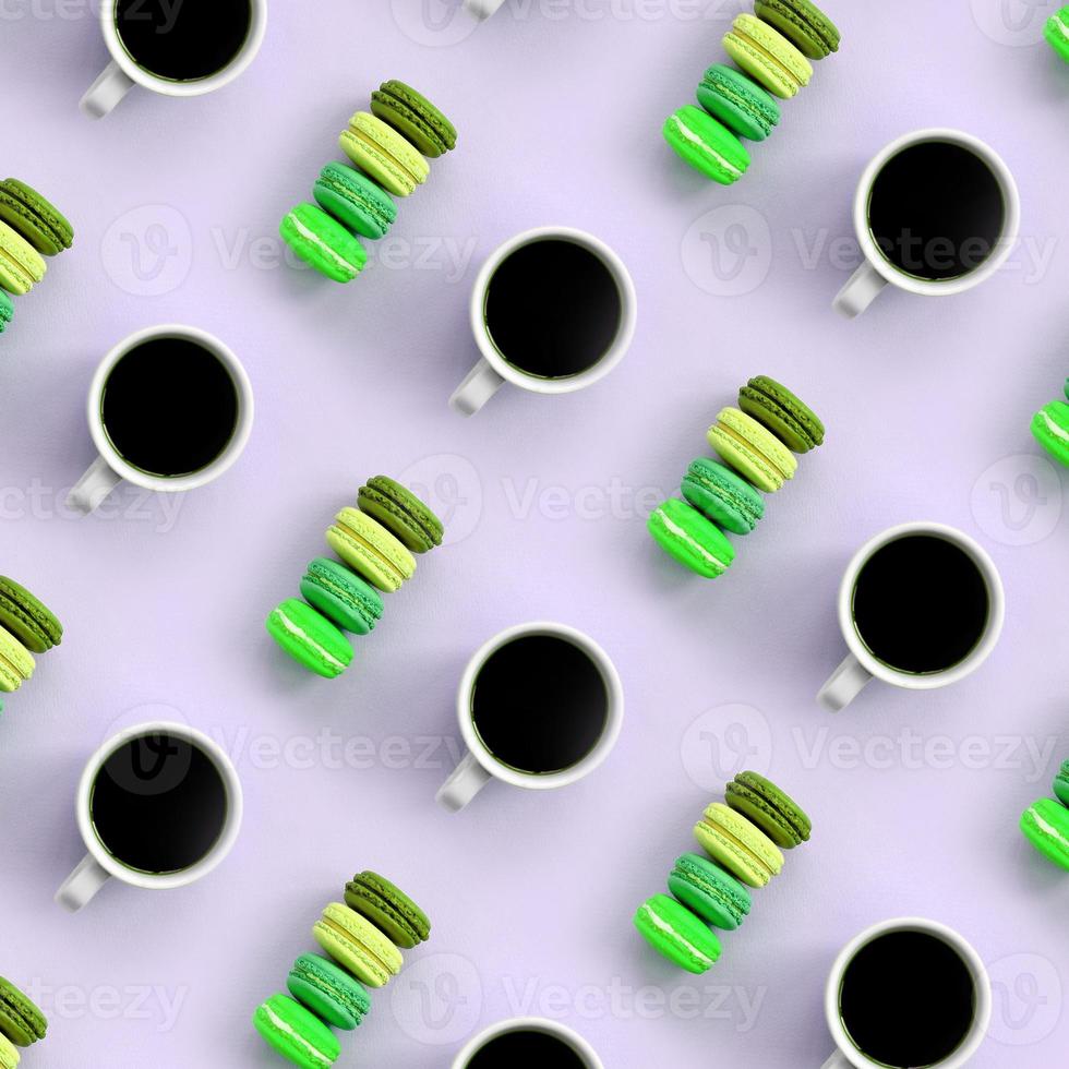 A pattern of many colorful dessert cake macaroon and coffee cups on trendy pastel lilac background top view photo