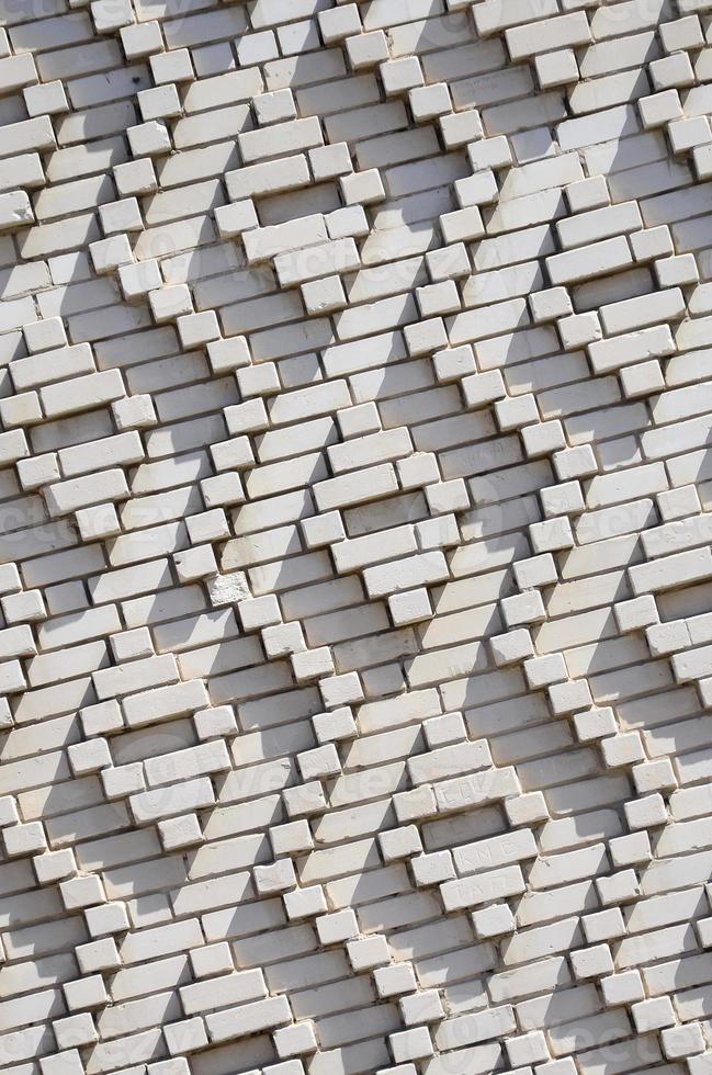 A pattern made of white bricks in the form of diamond shapes. Decoration of the walls during the Soviet Union photo