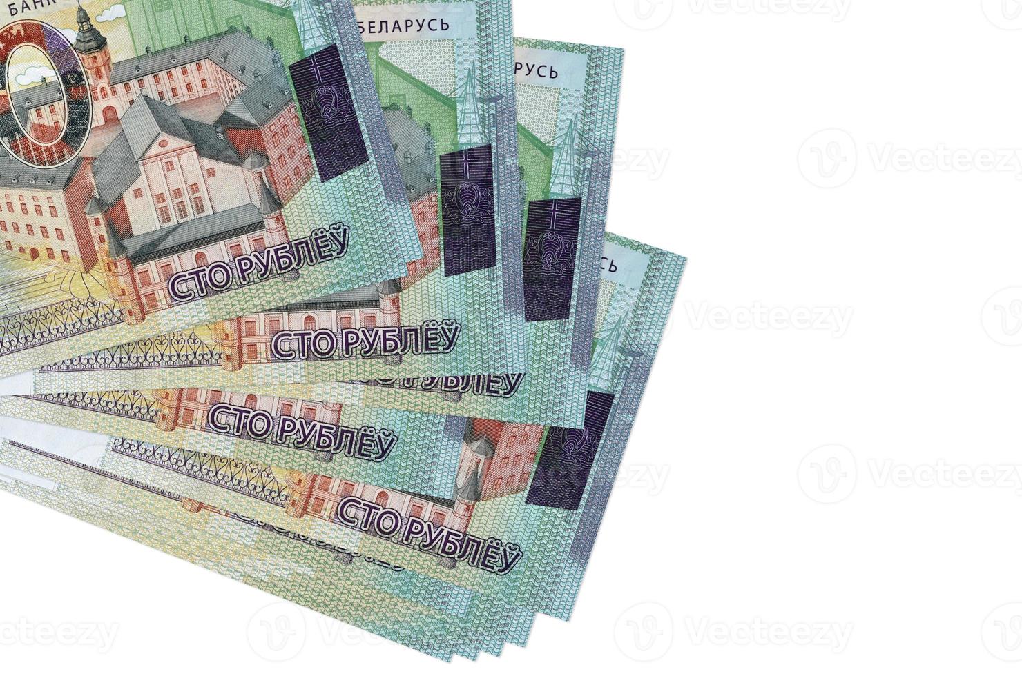 100 Belorussian rubles bills lies in small bunch or pack isolated on white. Mockup with copy space. Business and currency exchange photo
