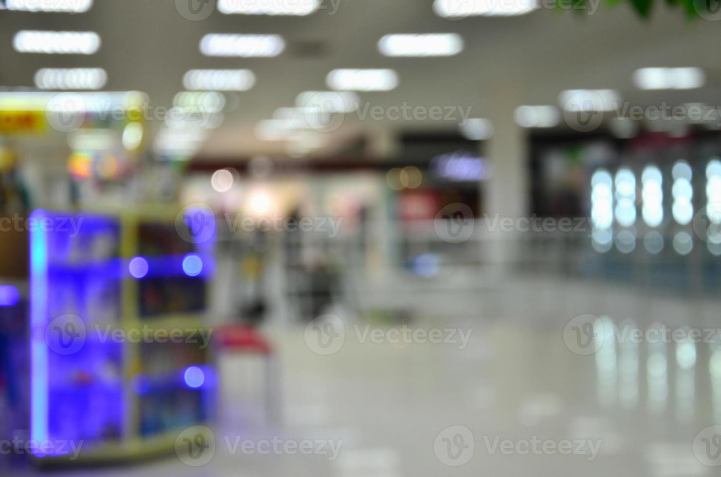 Blurred image of shopping mall interior photo