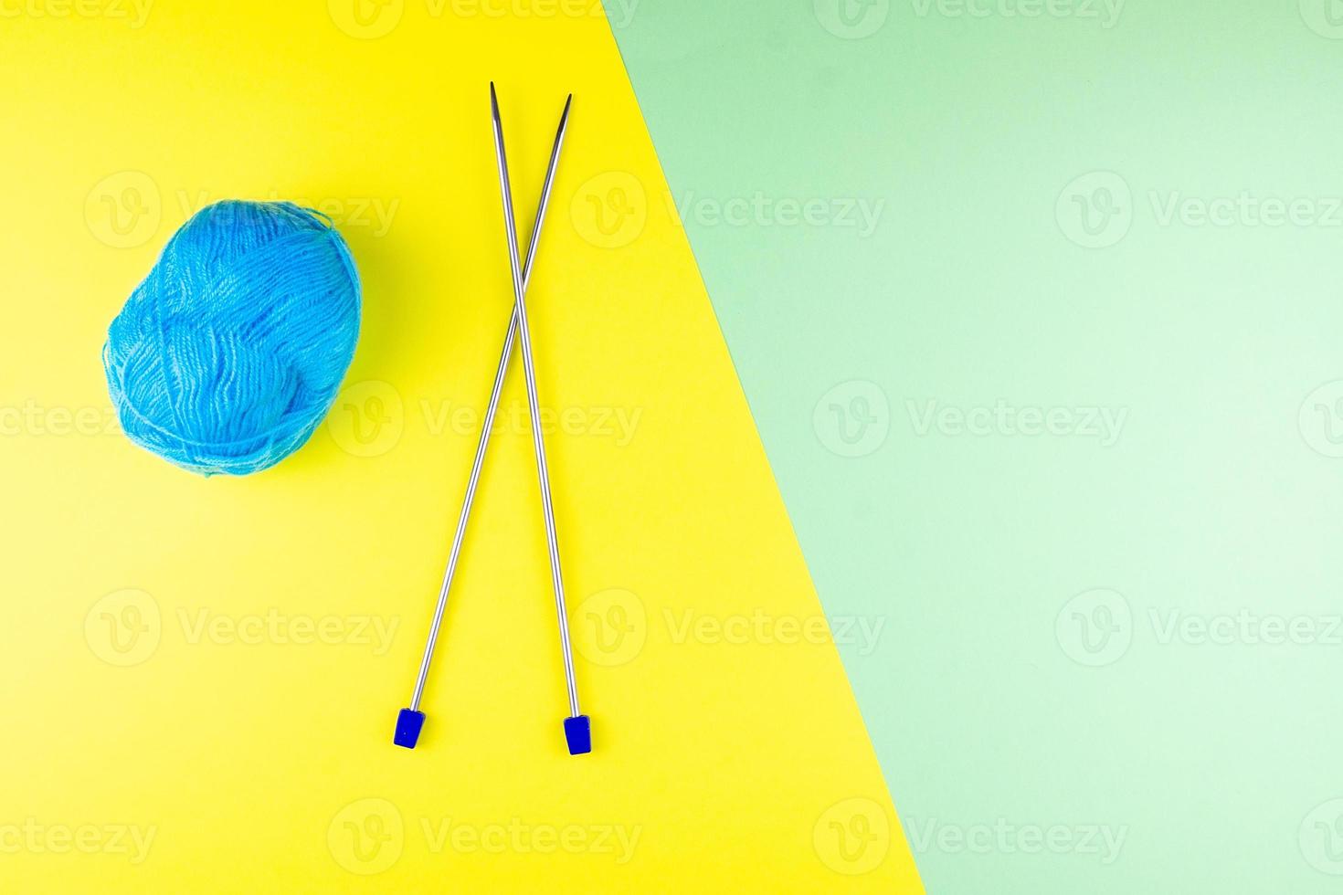 tangle and knitting needles photo