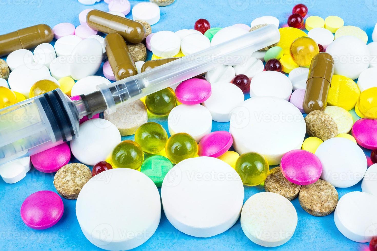 pills on a blue background photo