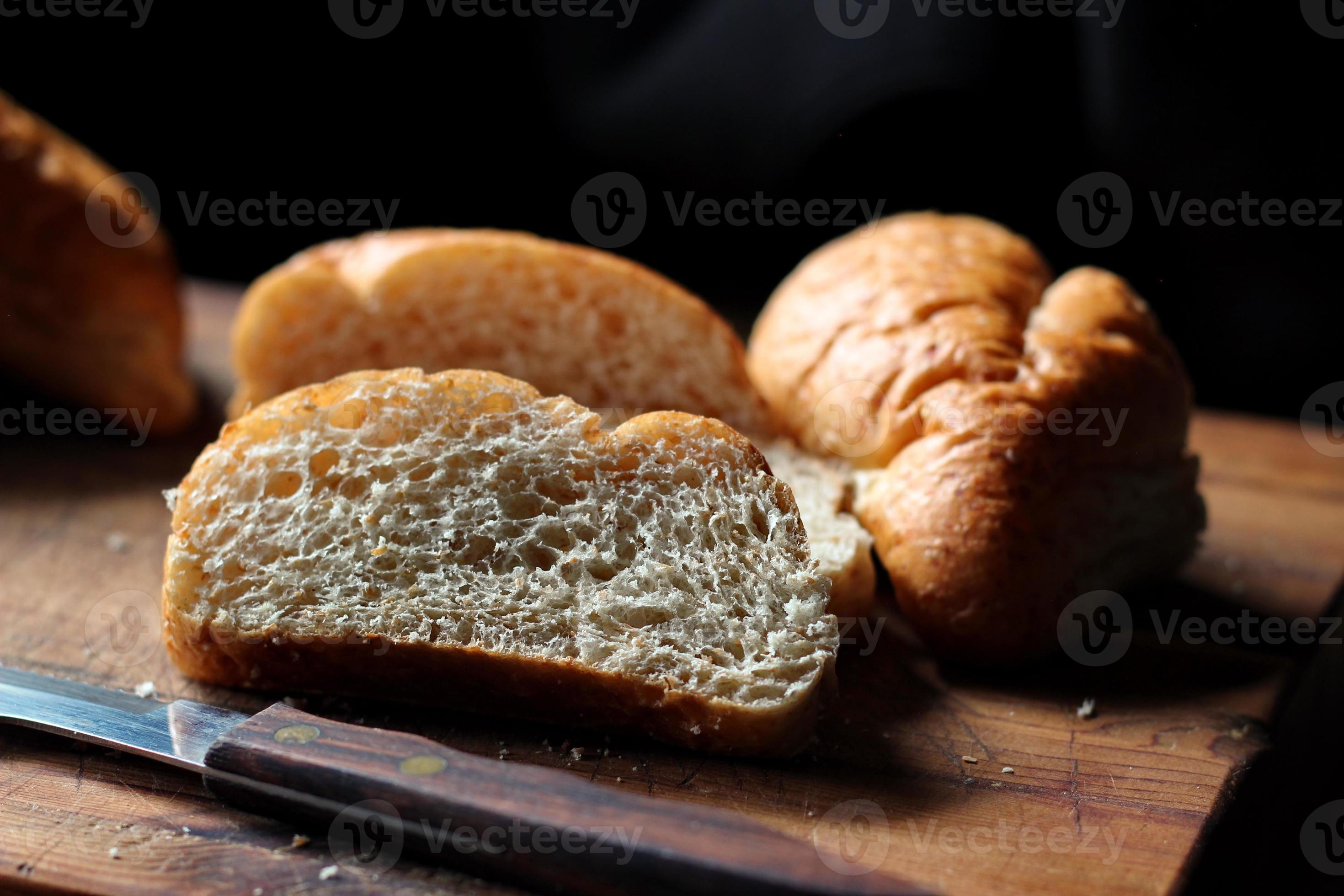 wheat bolillos made from wheat being sliced and ready to serve On a