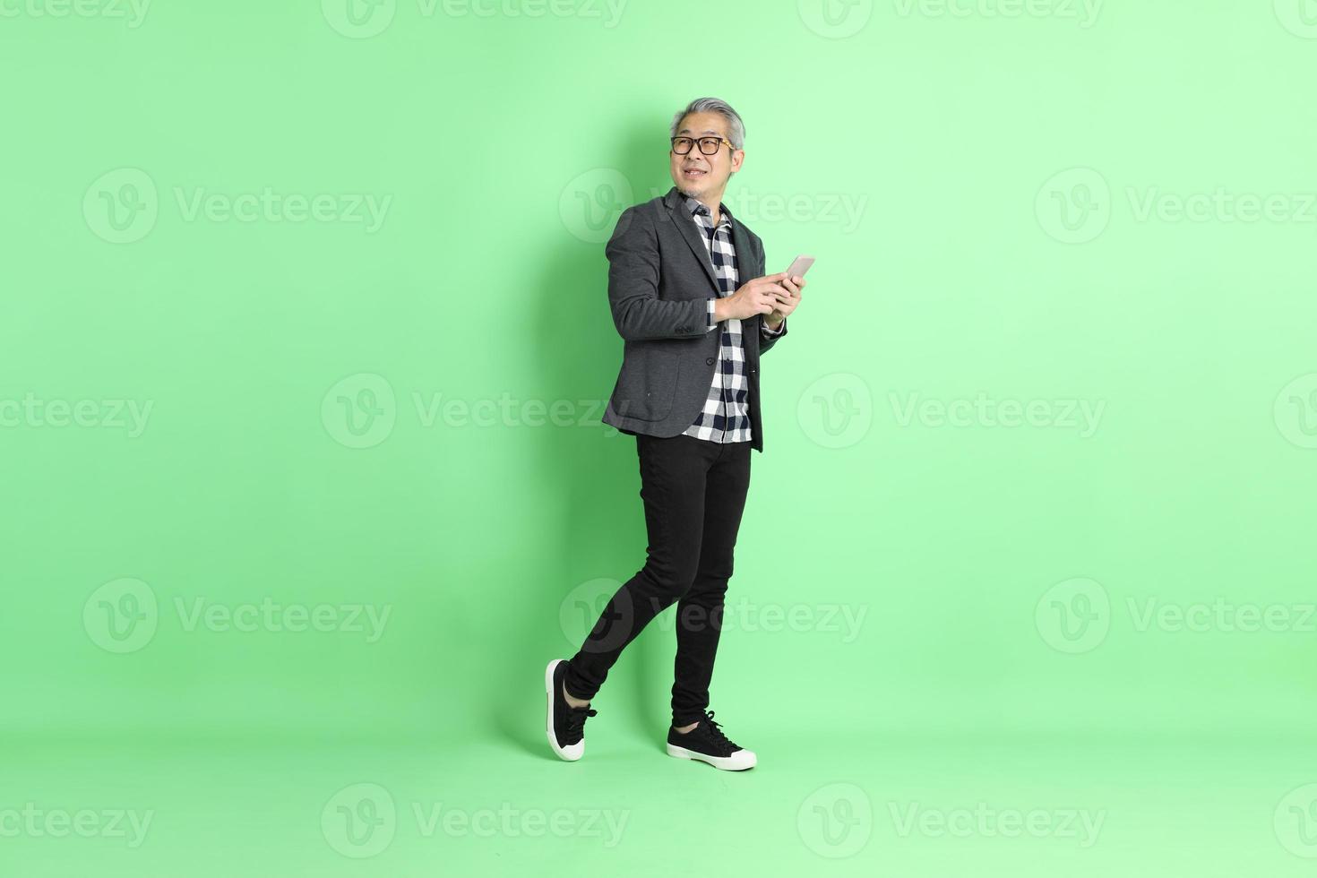 Asian Man on Green photo