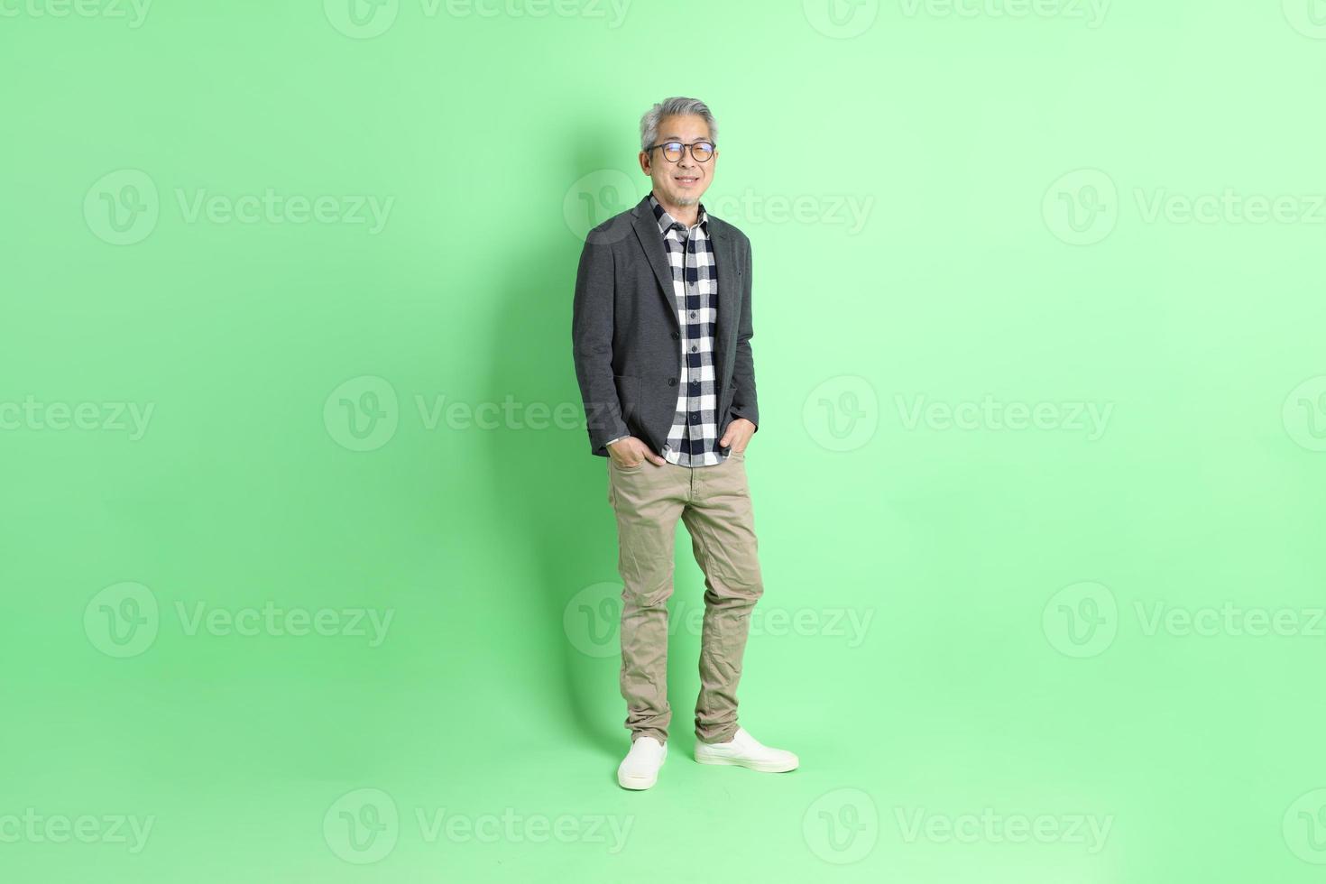 Asian Man on Green photo