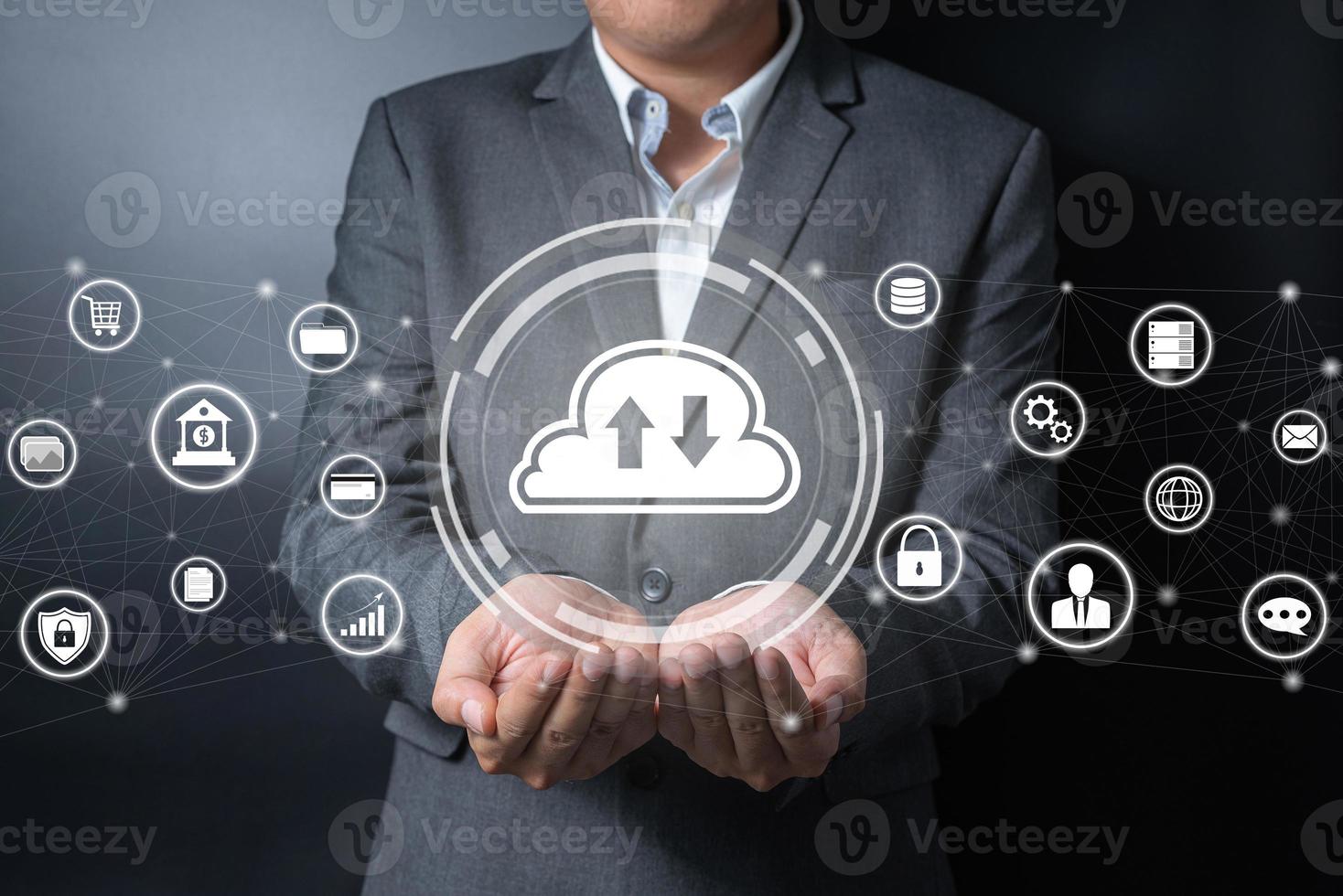 Double exposure of close up businessman holding cloud icon on balck and gray background photo