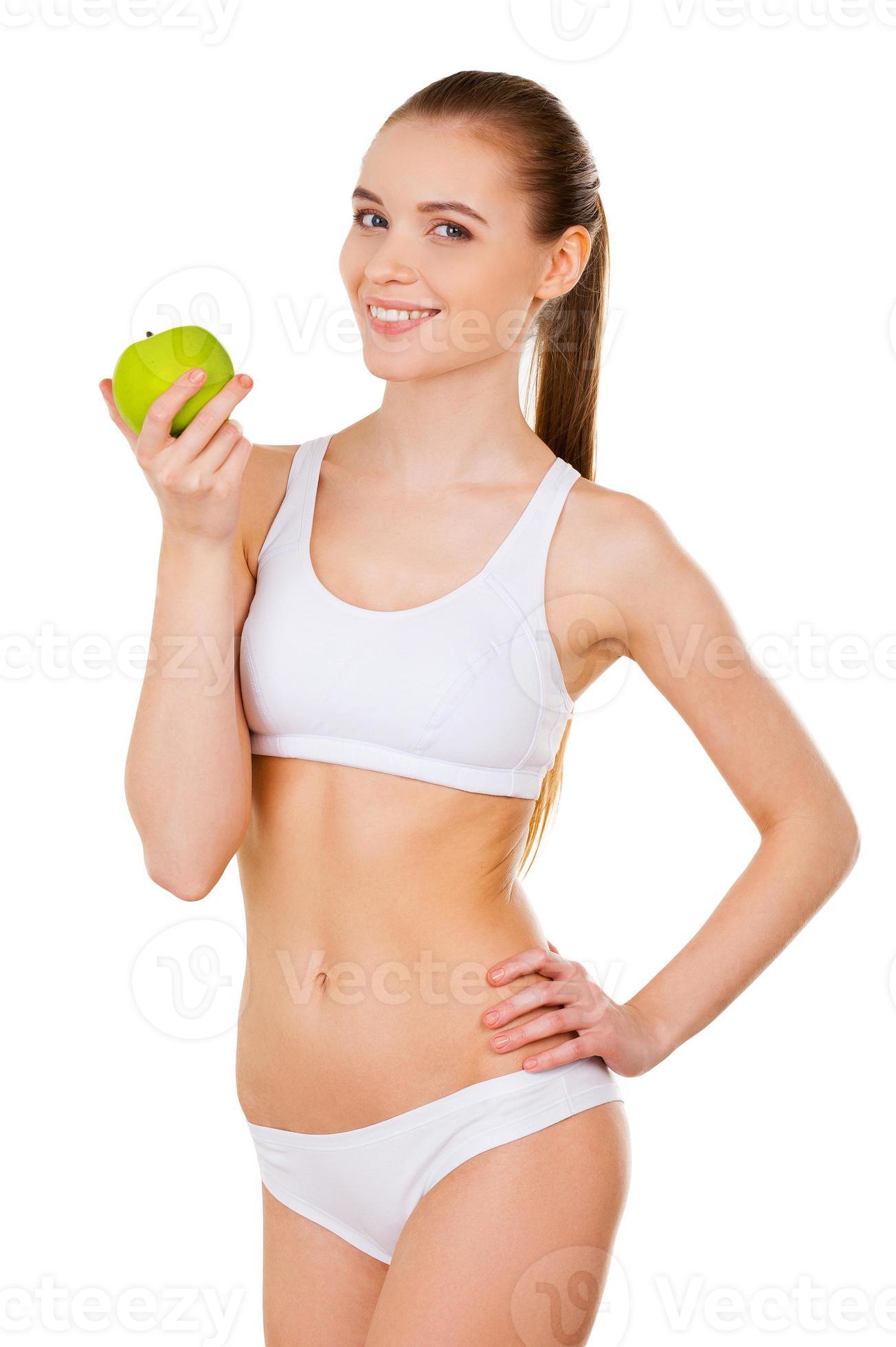 Be healthy Attractive young woman in white bra and panties holding one hand  on hip and pointing you while standing isolated on white 13591616 Stock  Photo at Vecteezy