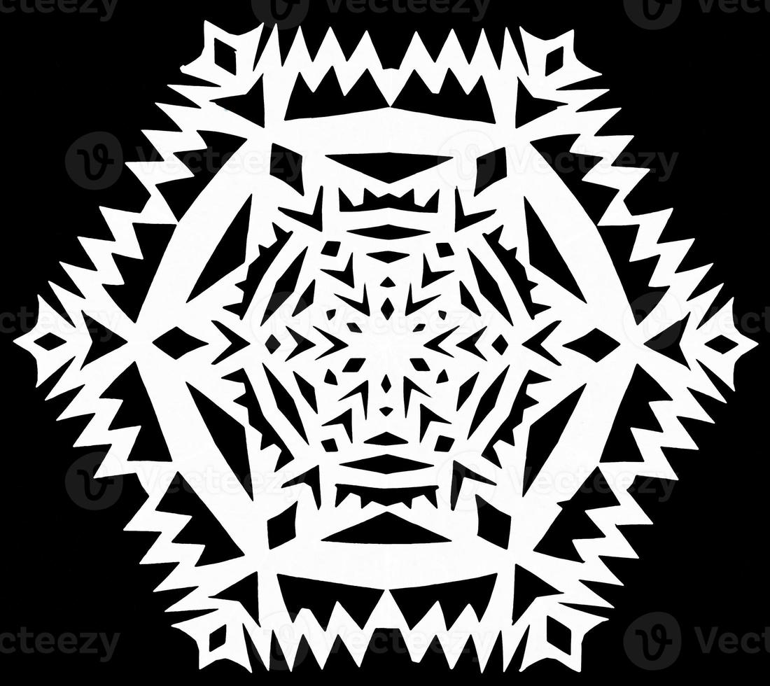 snowflake on black paper photo