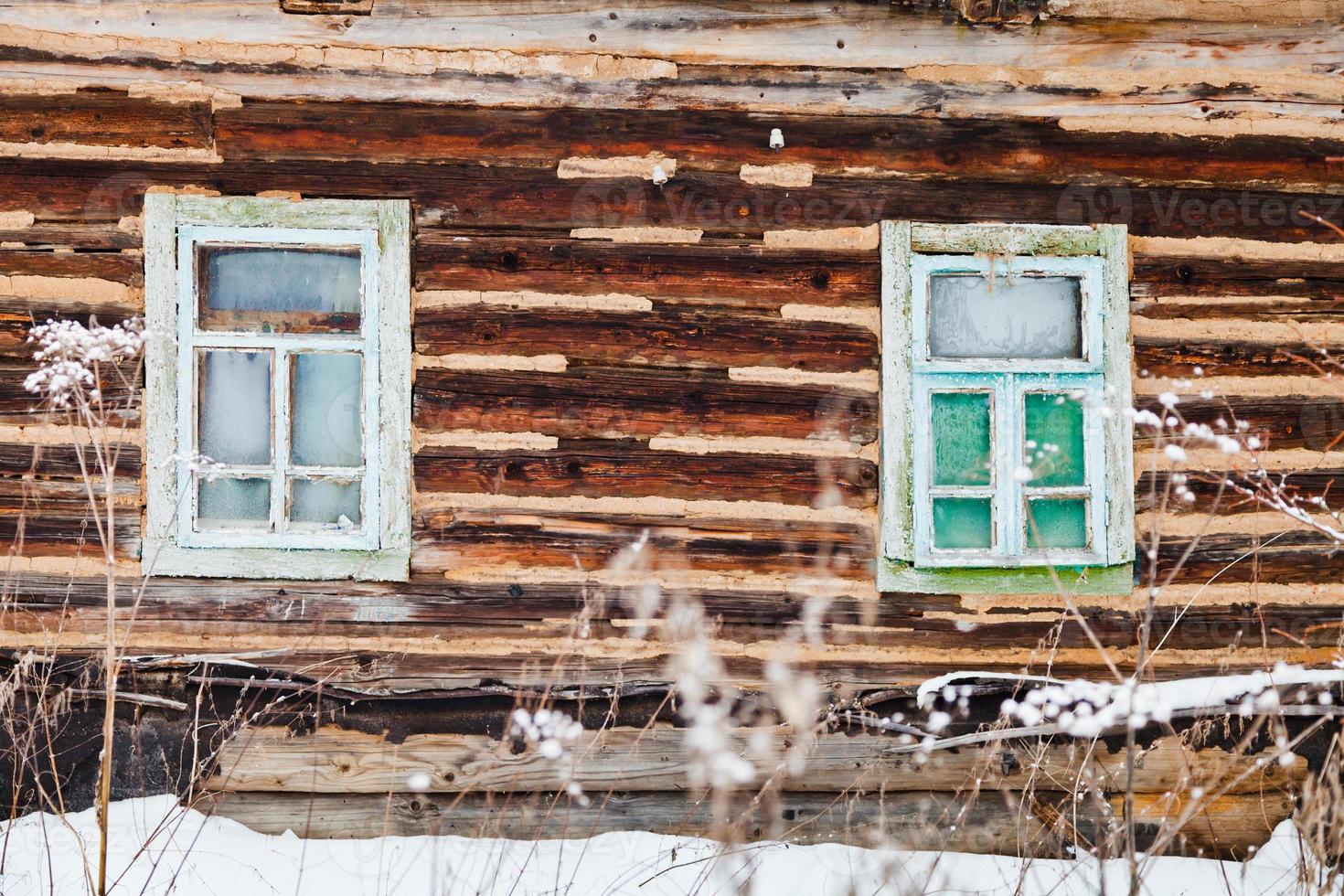 old timbered wall of rustic house photo