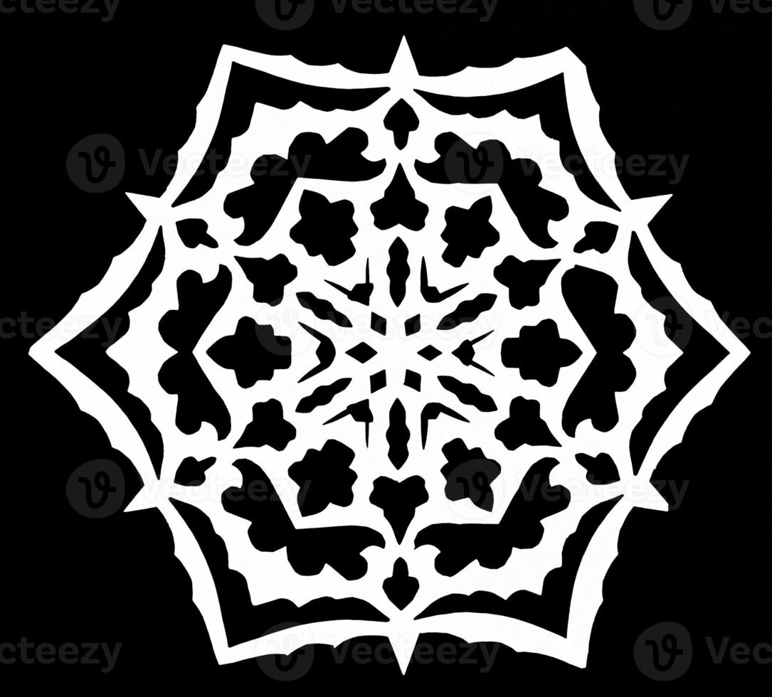 snowflake on black paper photo