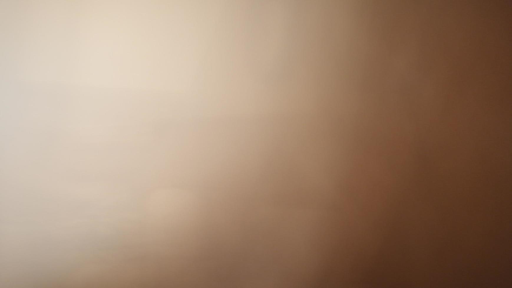 Abstract blur background with gray-brown, black, white, red and earth tones. photo