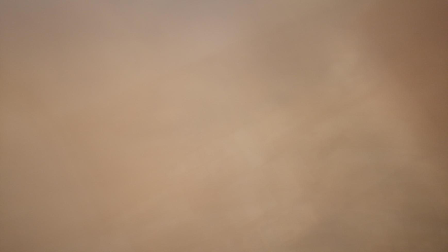 Abstract blur background with gray-brown, black, white, red and earth tones. photo