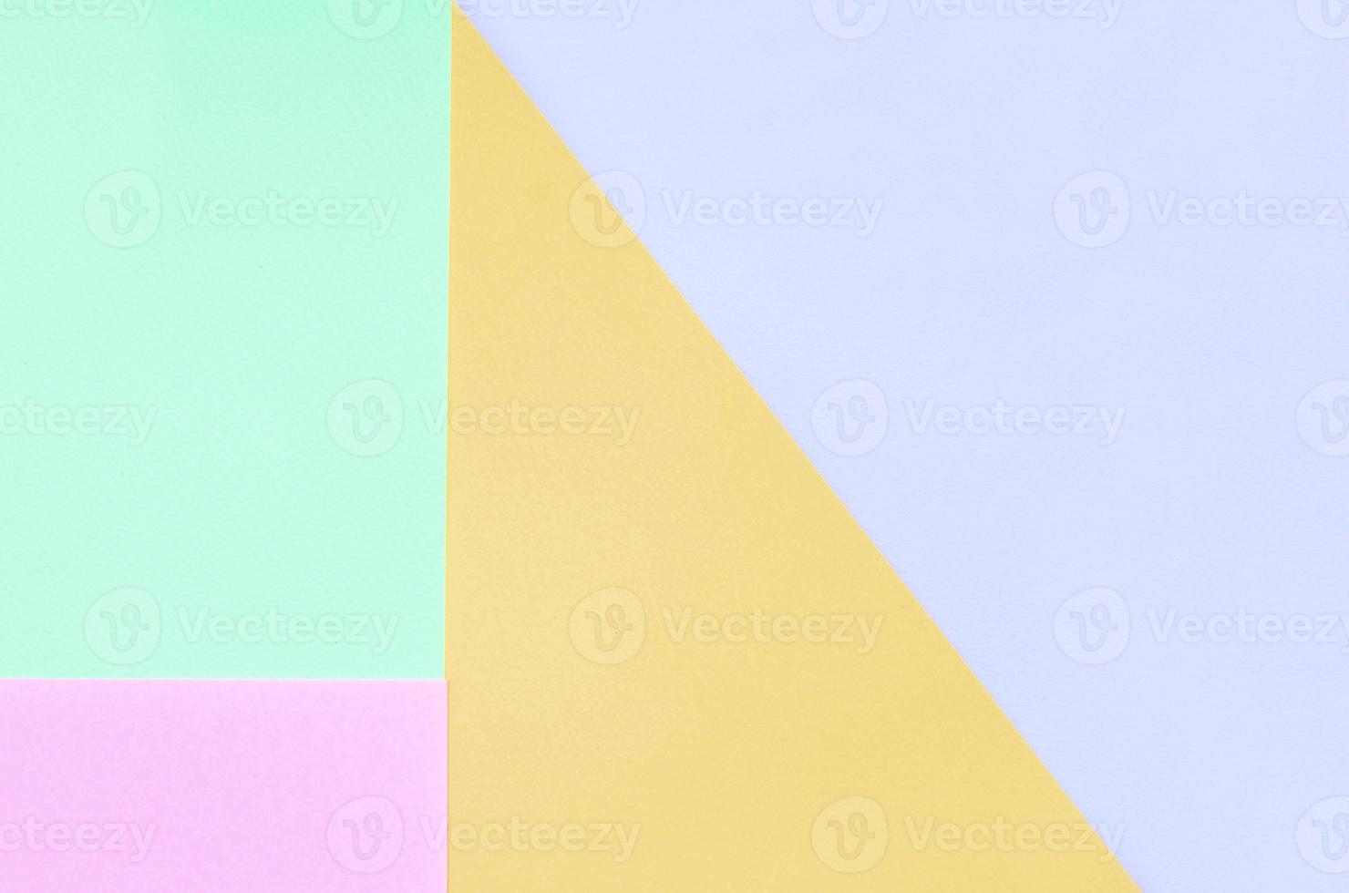 Texture background of fashion pastel colors. Pink, violet, orange and blue geometric pattern papers. photo