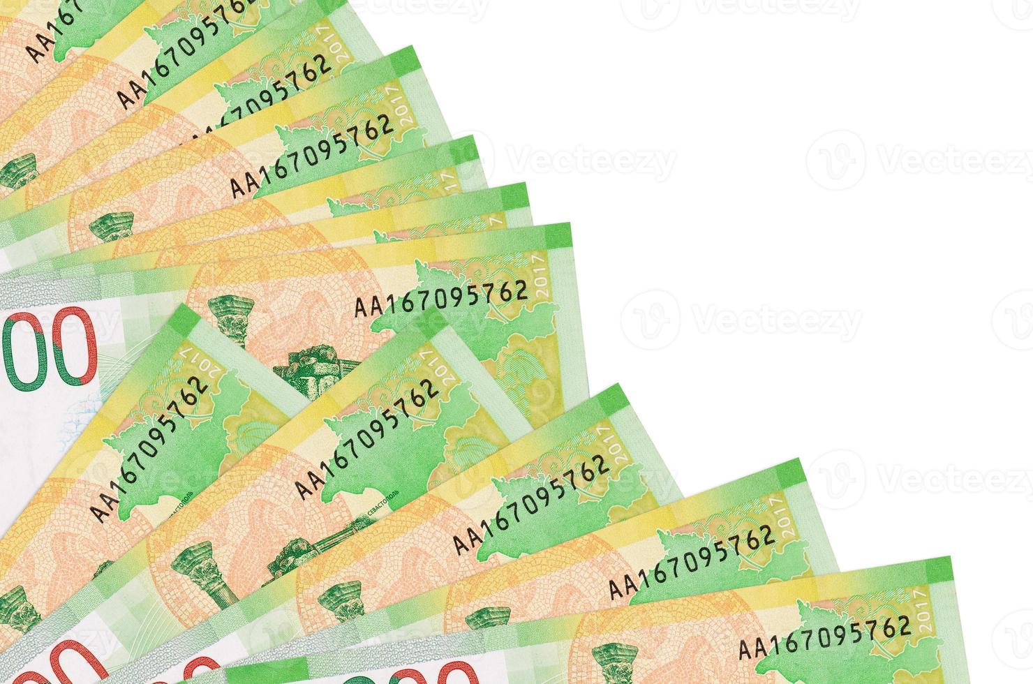 200 russian rubles bills lies isolated on white background with copy space stacked in fan close up photo